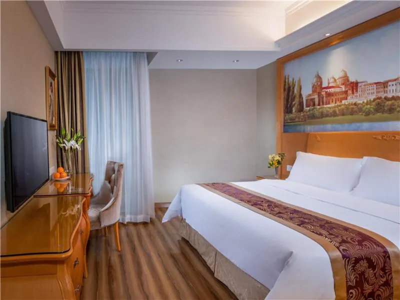 Bed in Vienna International Hotel (Shen Zhen Buji Dafen shop)