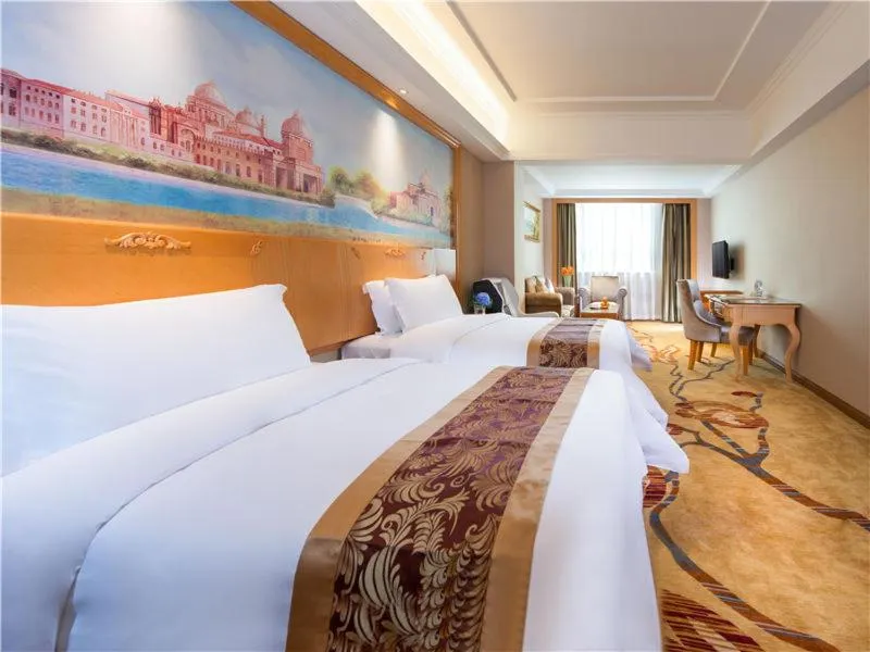 Bed in Vienna International Hotel (Shen Zhen Buji Dafen shop)