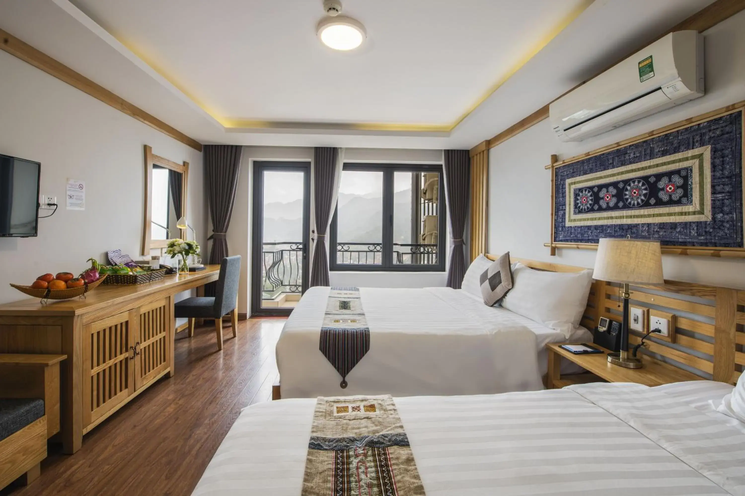 Deluxe Triple Room (1 Double Bed + 1 Single Bed) in Sapa Highland Resort & Spa Deluxe Triple Room (1 Double Bed + 1 Single Bed) in Sapa Highland Resort & Spa