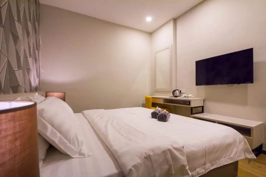 Photo of the whole room, Bed in OMG Hotel