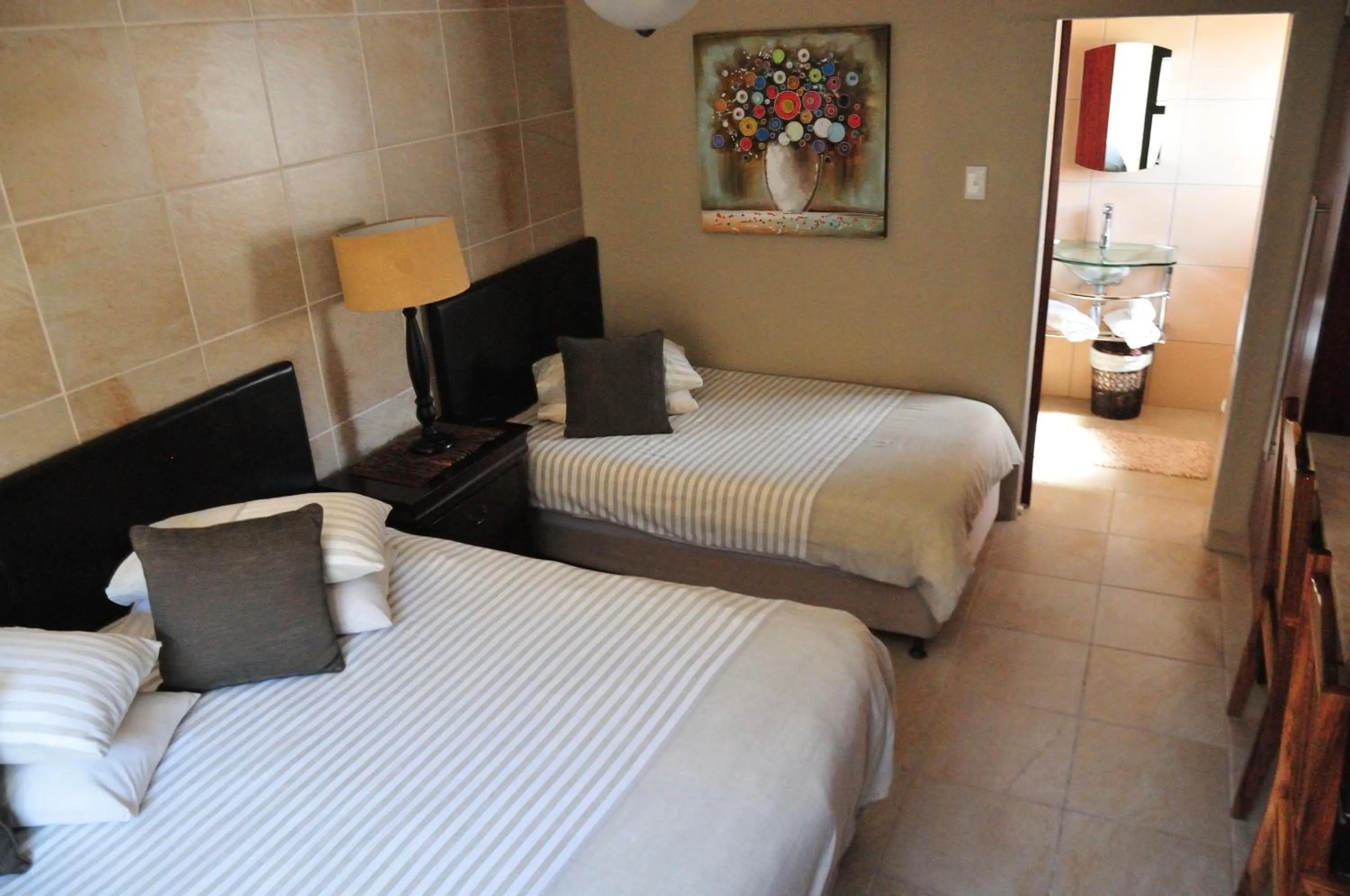 Bed in Mi Casa Guest House