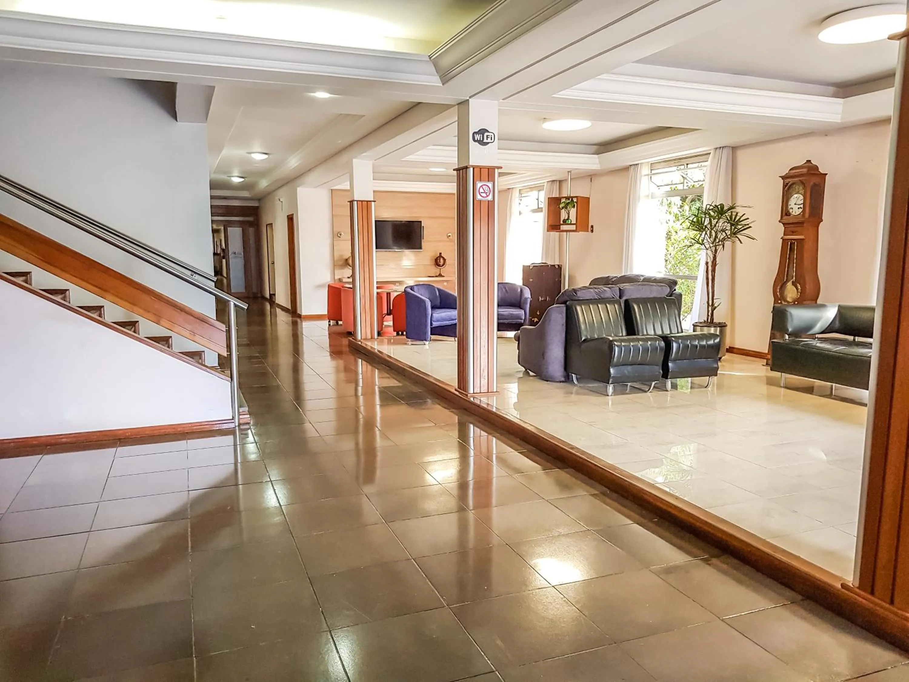 Lobby or reception in Milão Hotel