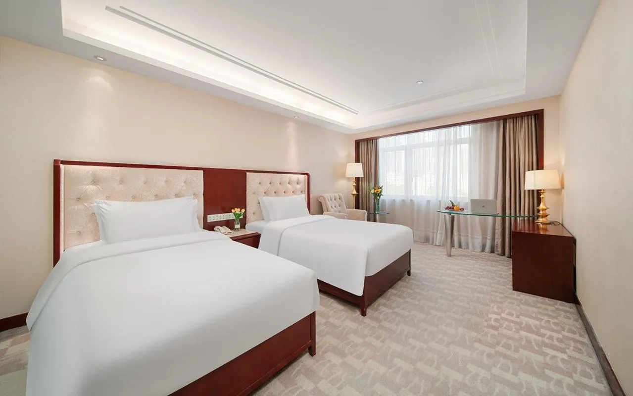 Bed in Ramada Shenzhen Baoan
