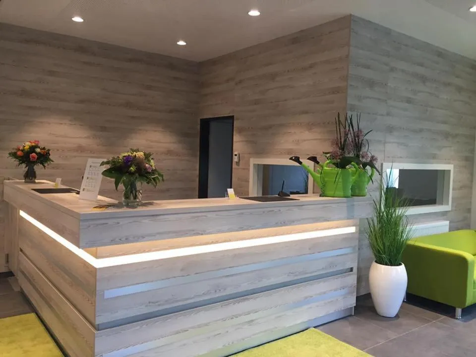 Lobby or reception in Novina Sleep Inn Herzogenaurach