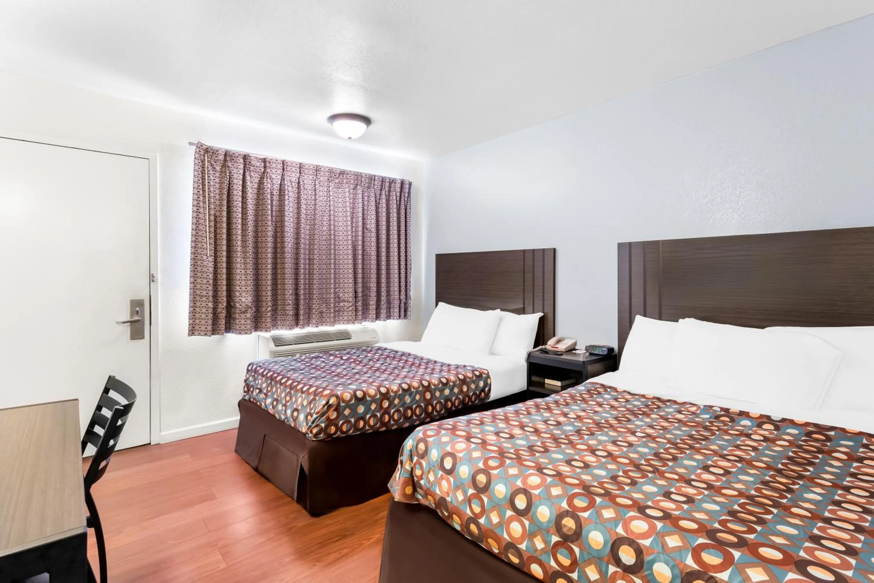 Bed in Americas Best Value Inn Stillwater