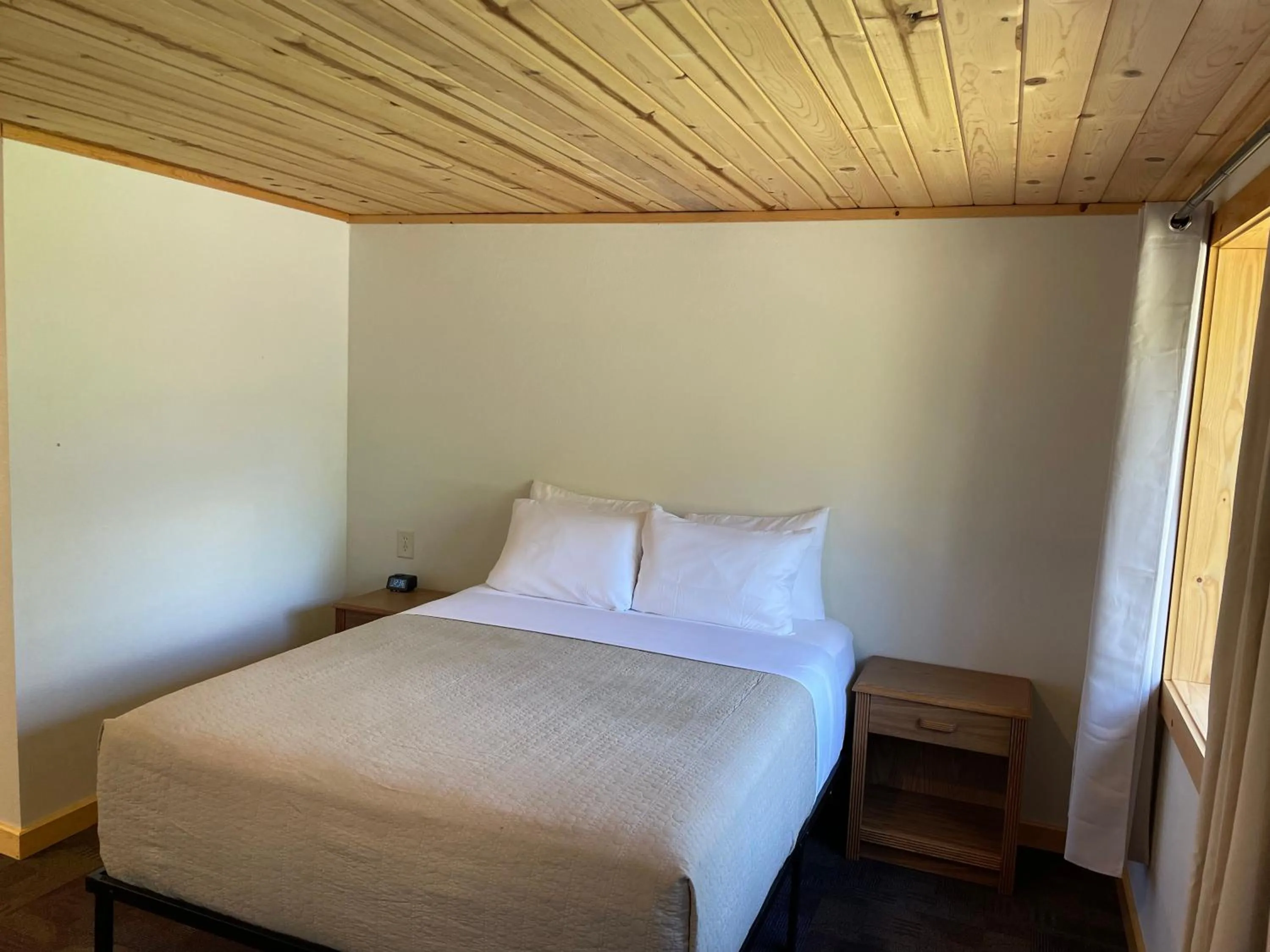 Bed in Hanging Horn Lakeside Resort