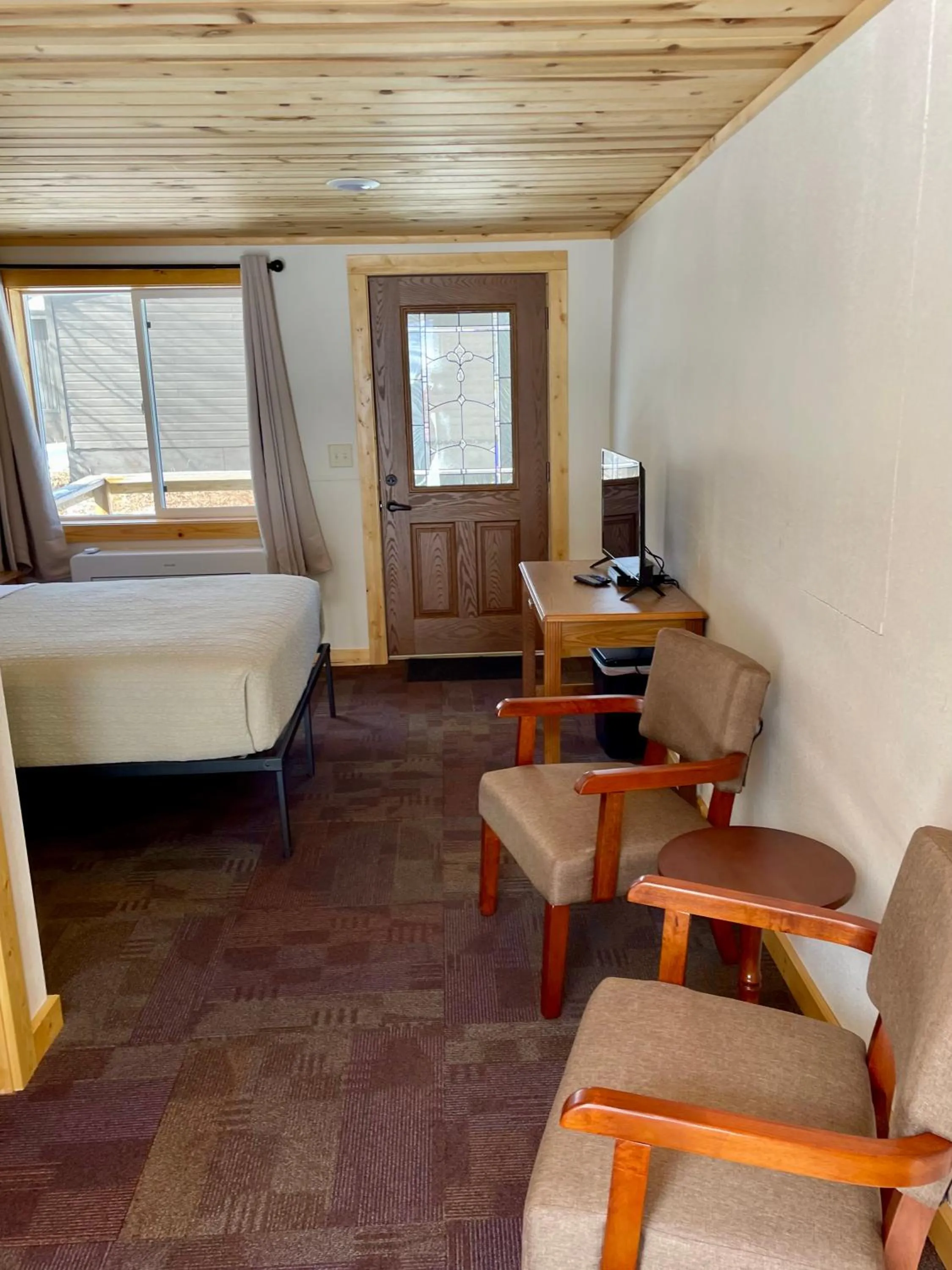 Bed in Hanging Horn Lakeside Resort