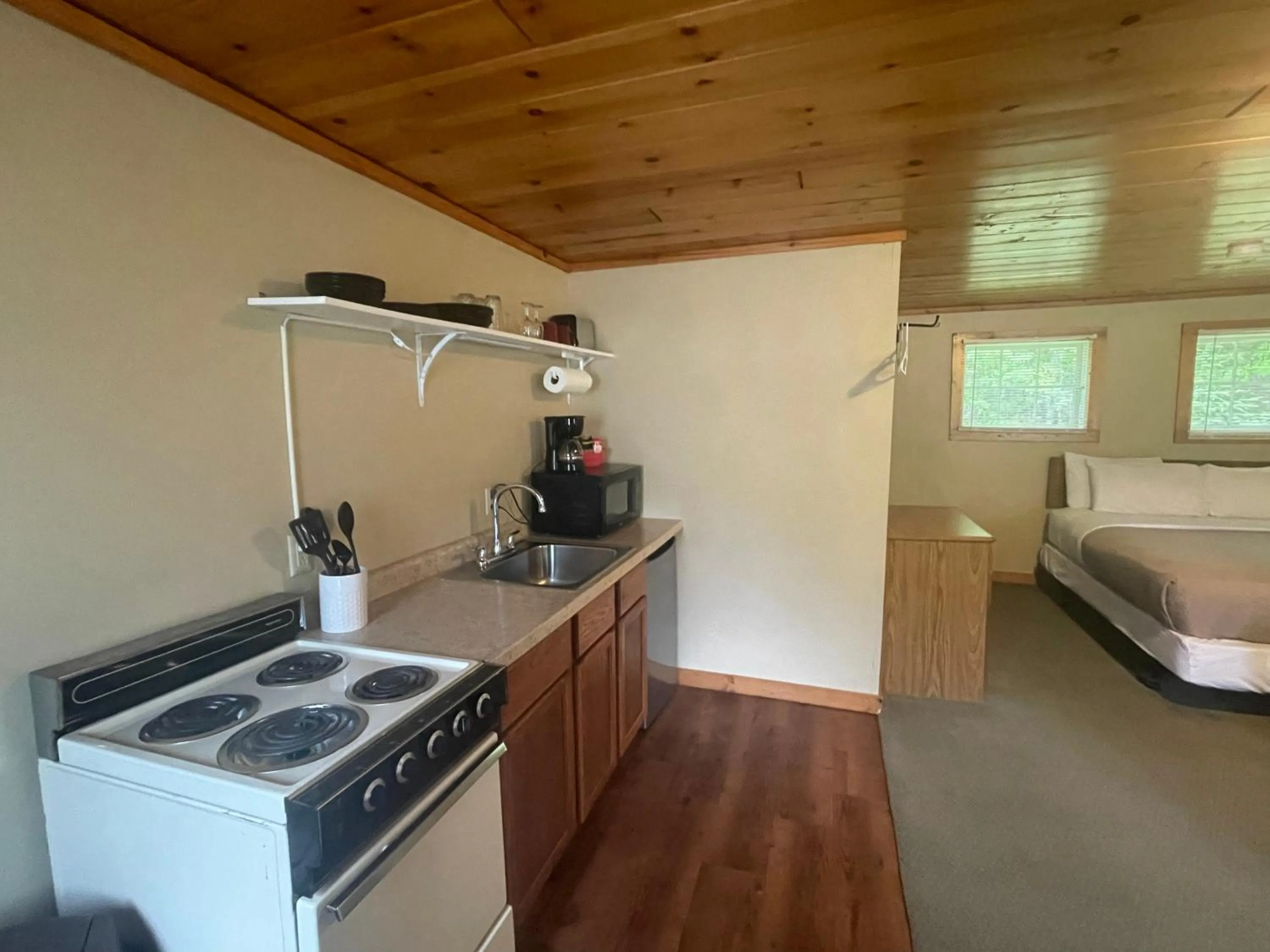 Bed in Hanging Horn Lakeside Resort