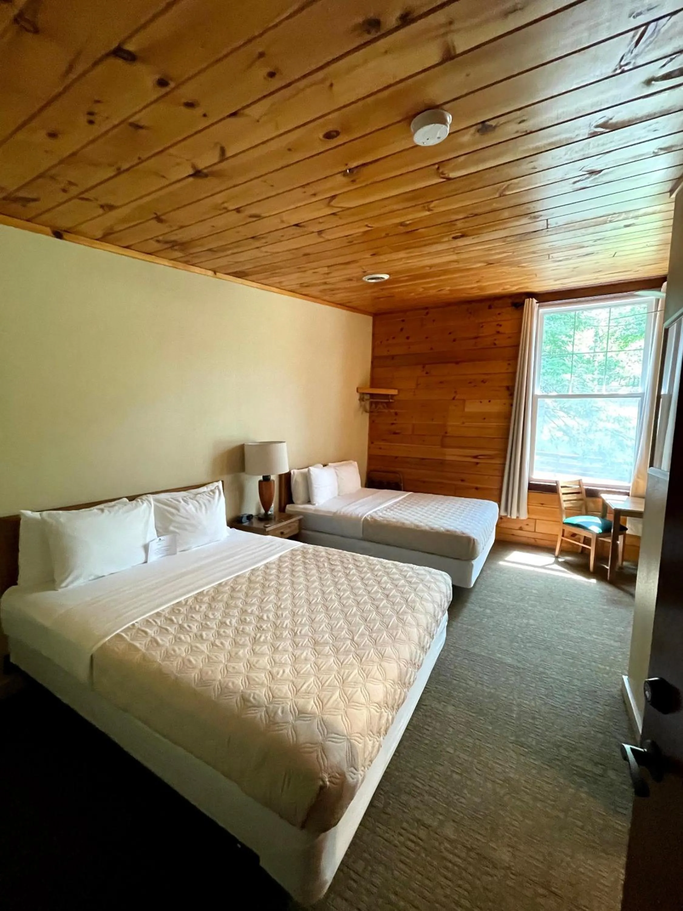 Bed in Hanging Horn Lakeside Resort