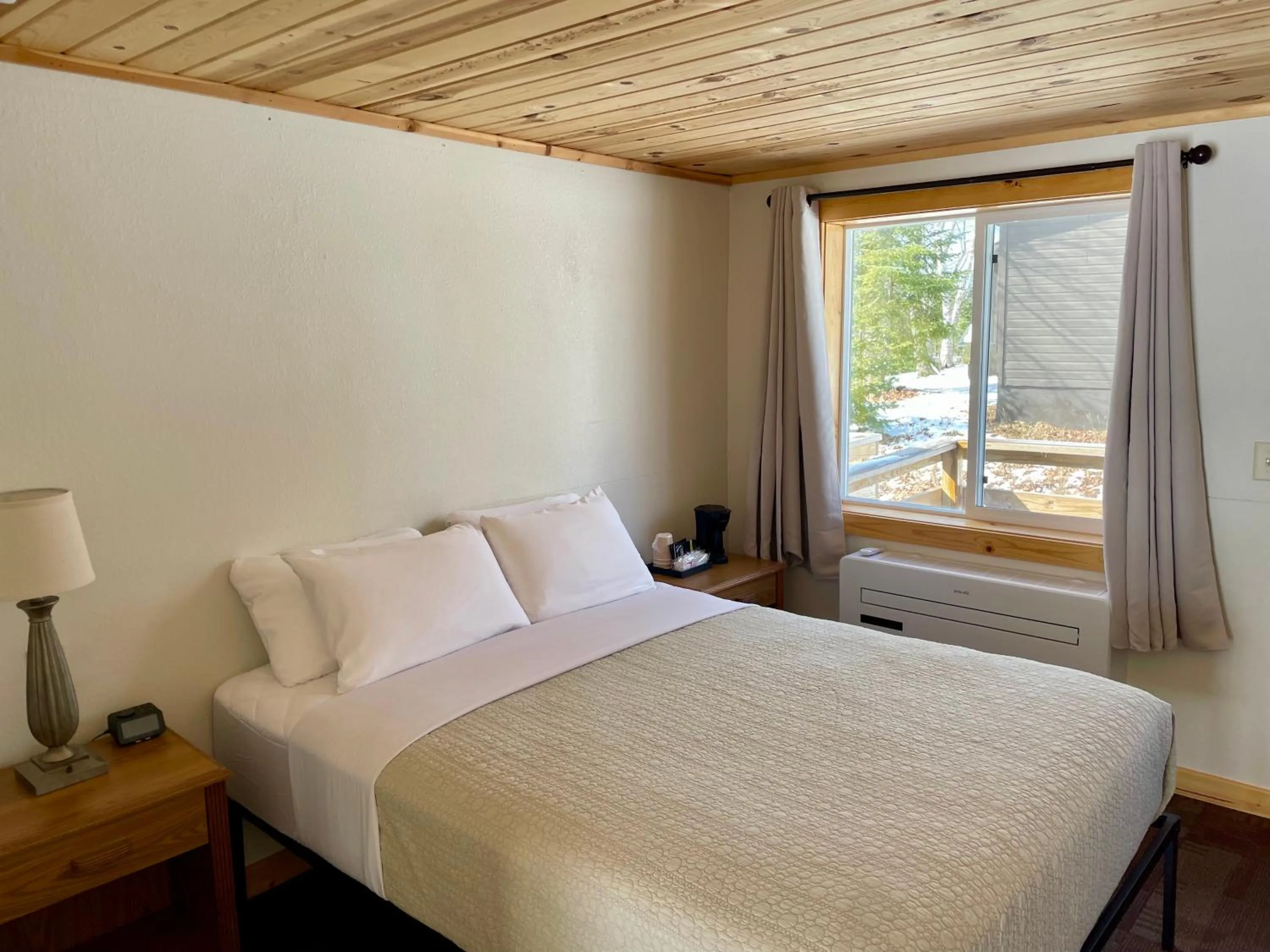 Bed in Hanging Horn Lakeside Resort