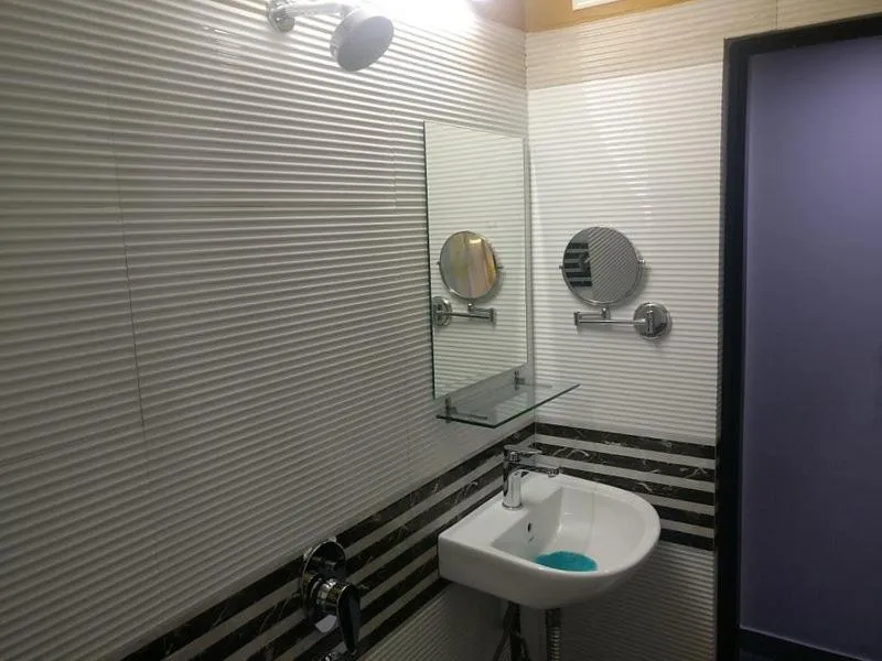 Bathroom in Hotel KK Residency
