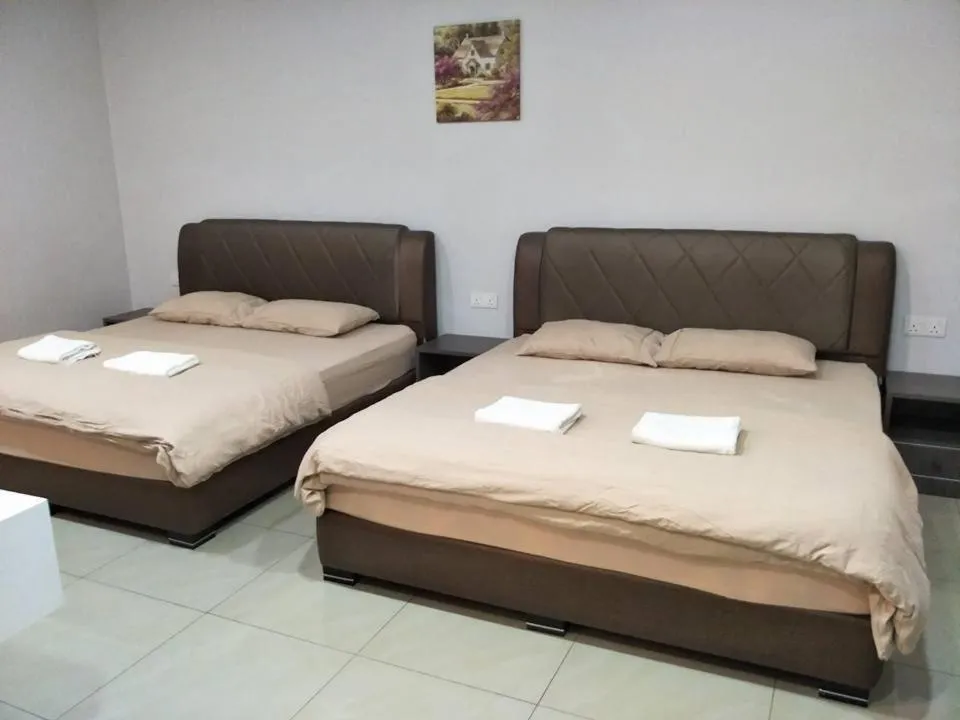 Bed in Lim Mini Hotel