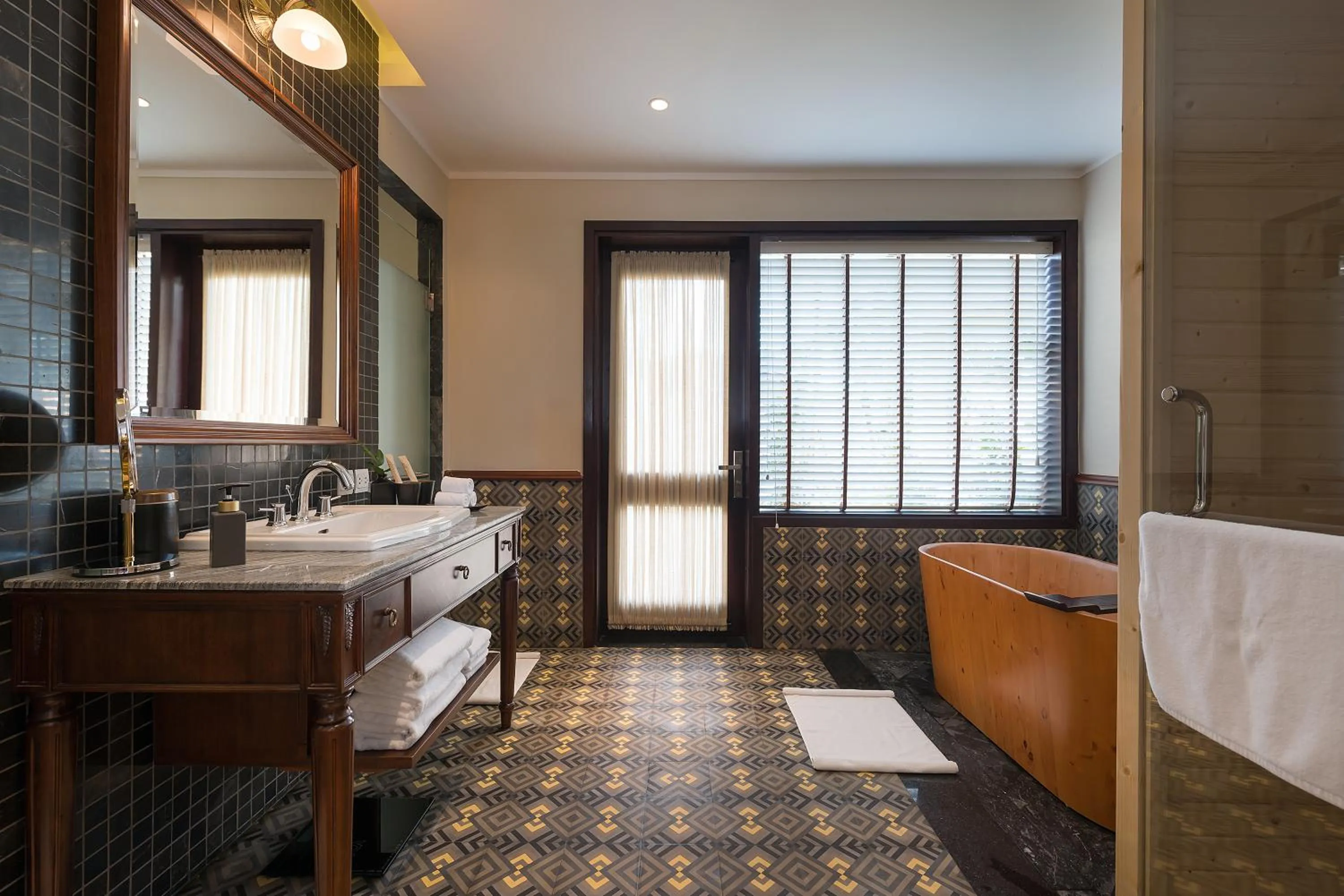 Bathroom, Bed in La Siesta Hoi An Resort & Spa