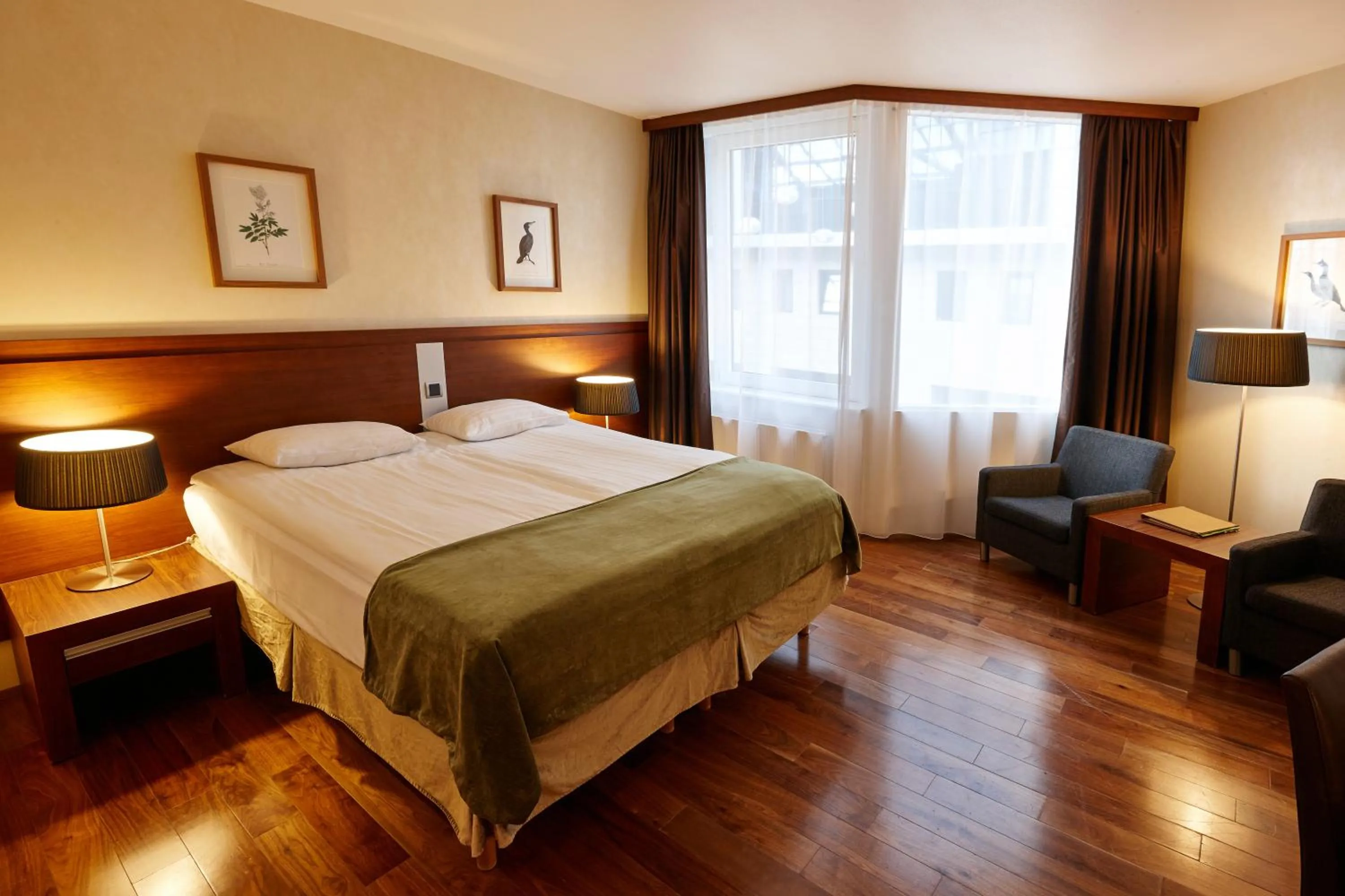 Living room, Bed in Hotel Reykjavík Grand