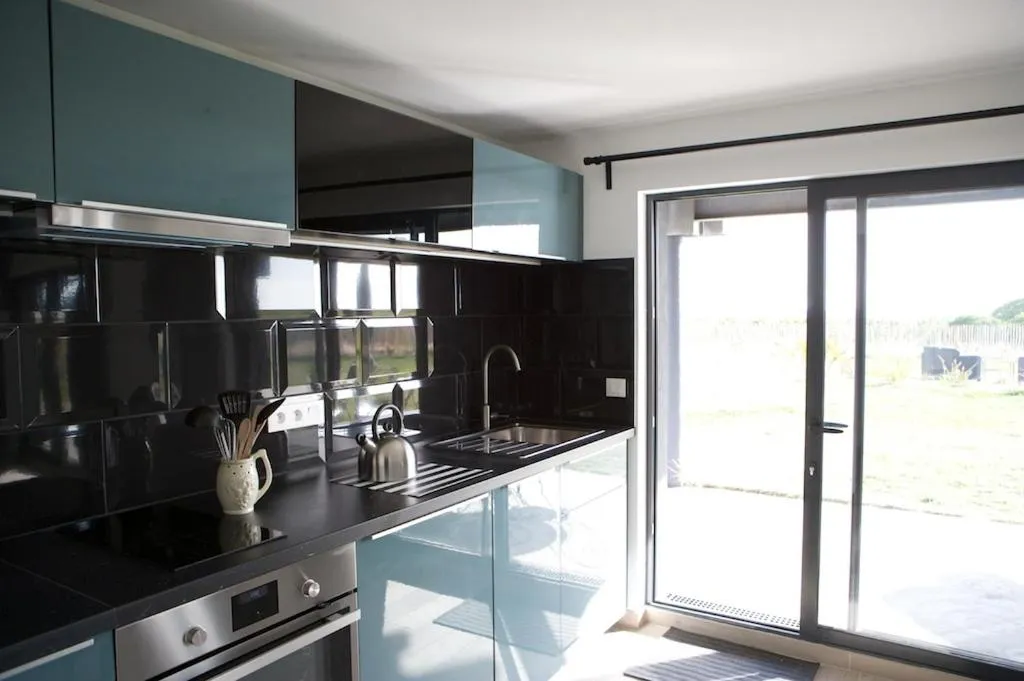 Kitchen or kitchenette in Villa Belmont