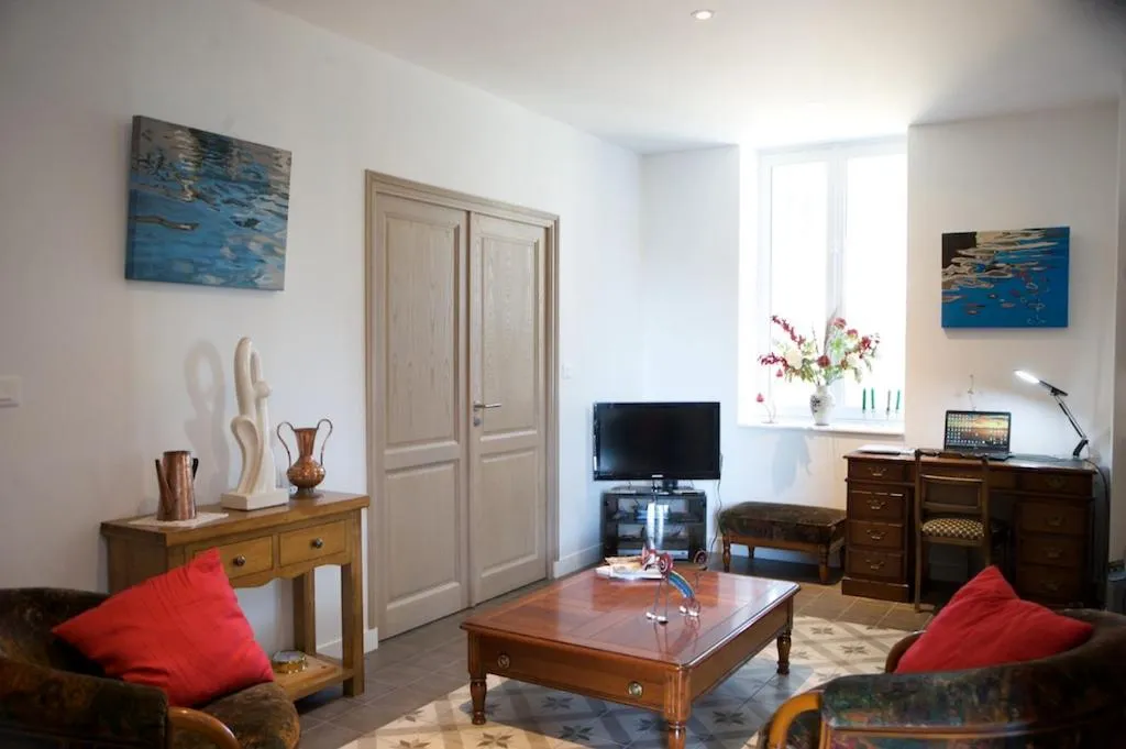 Communal lounge/ TV room in Villa Belmont