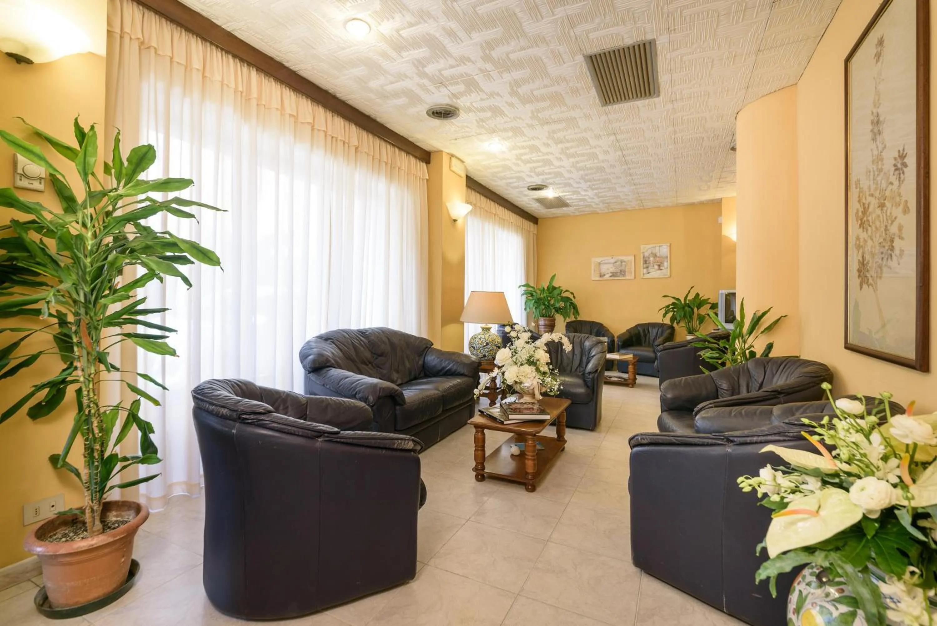 Communal lounge/ TV room in Hotel Morchio Mhotelsgroup