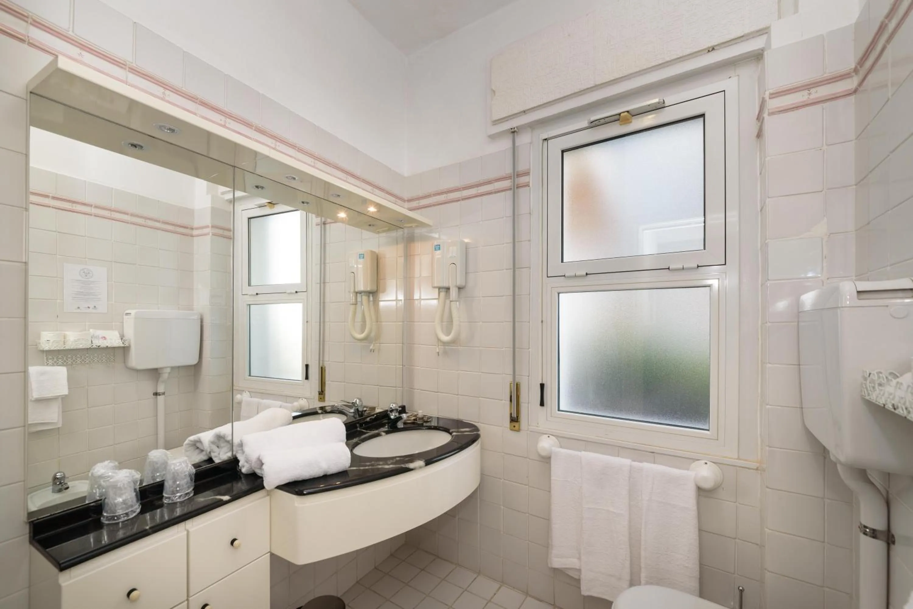 Bathroom in Hotel Morchio Mhotelsgroup