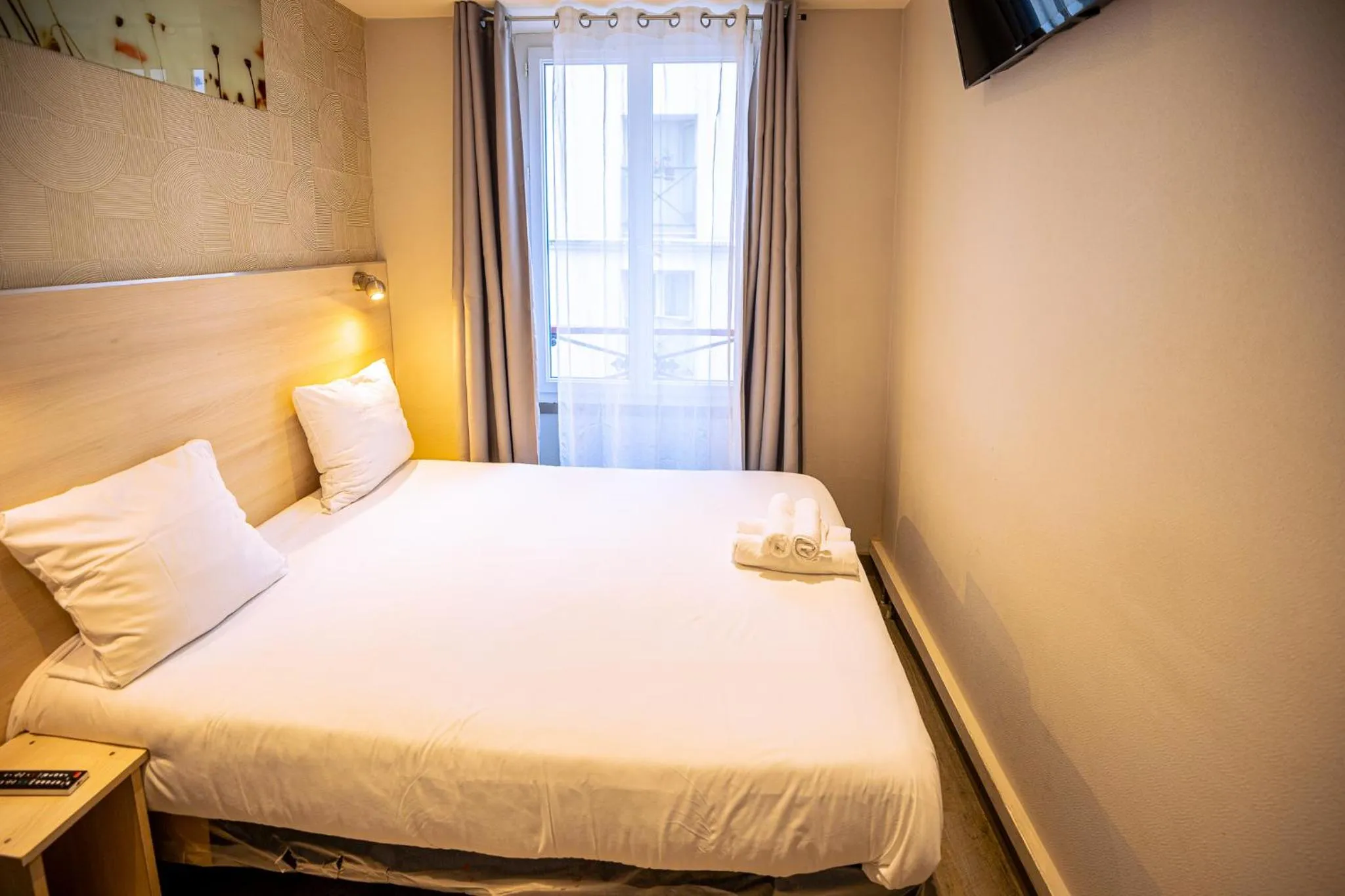 Bed in Hotel Aix Europe