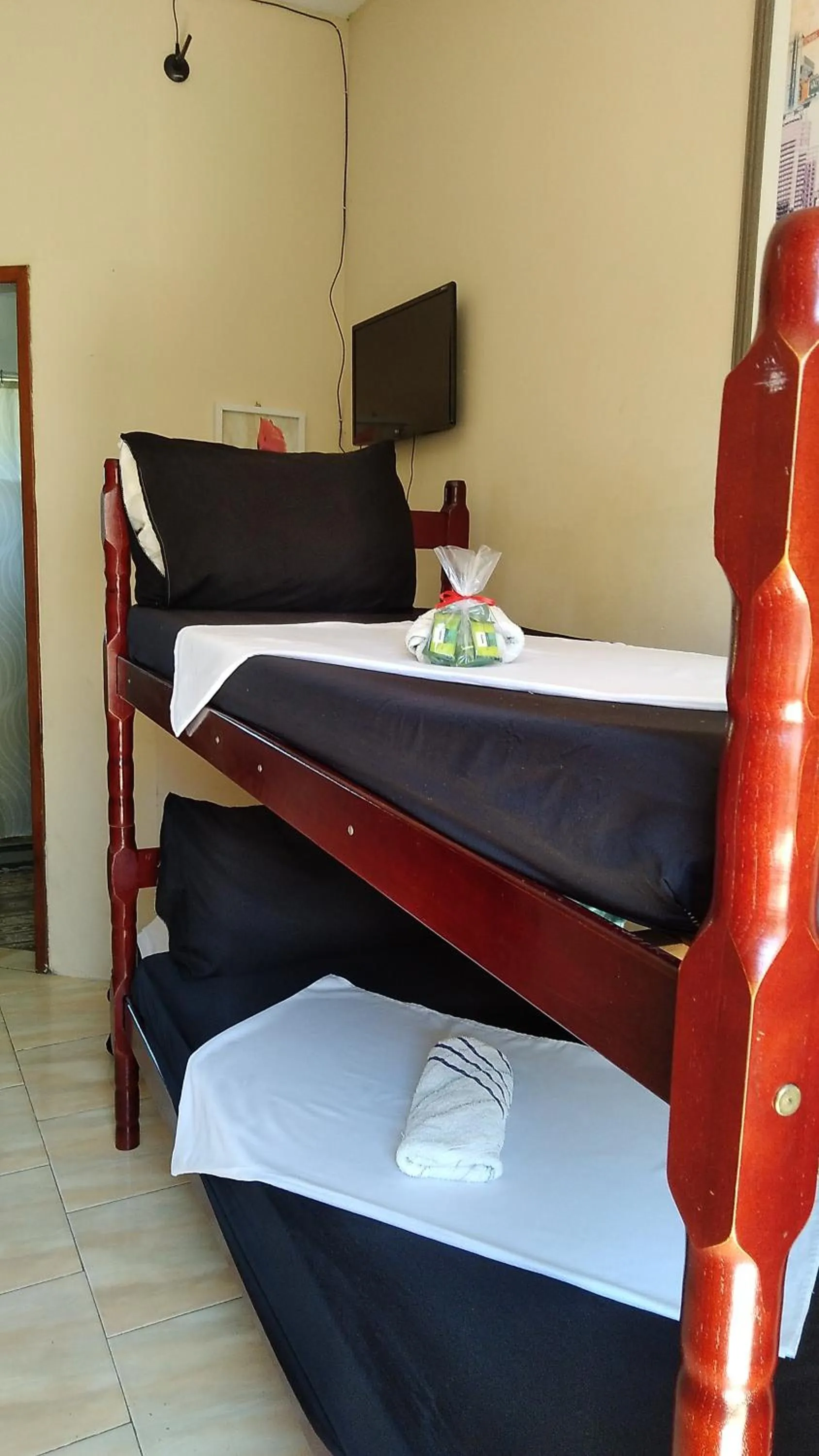 Bed in Pousada Ilha Margarita