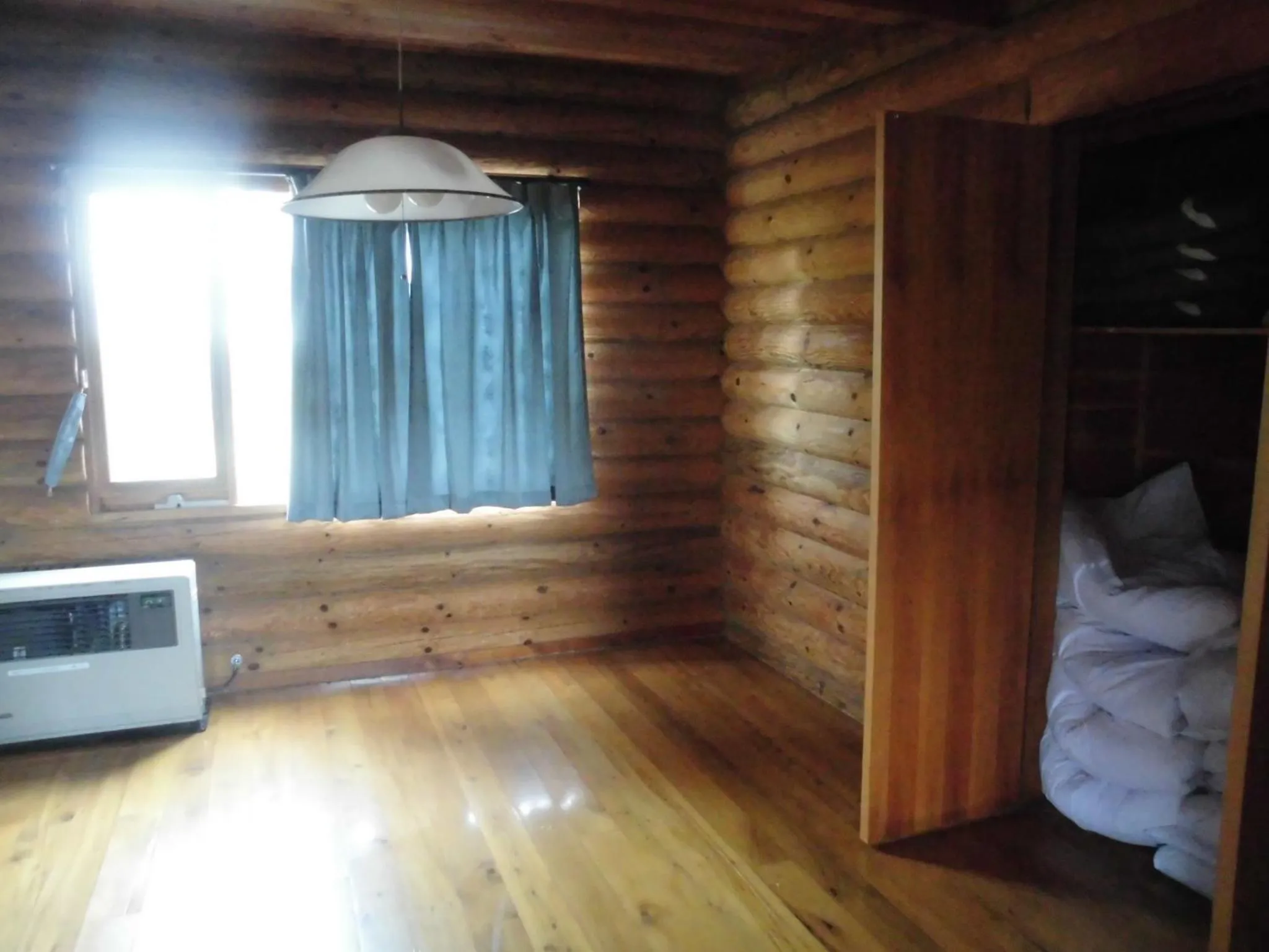 Bed in Log Cottage Villa Happo