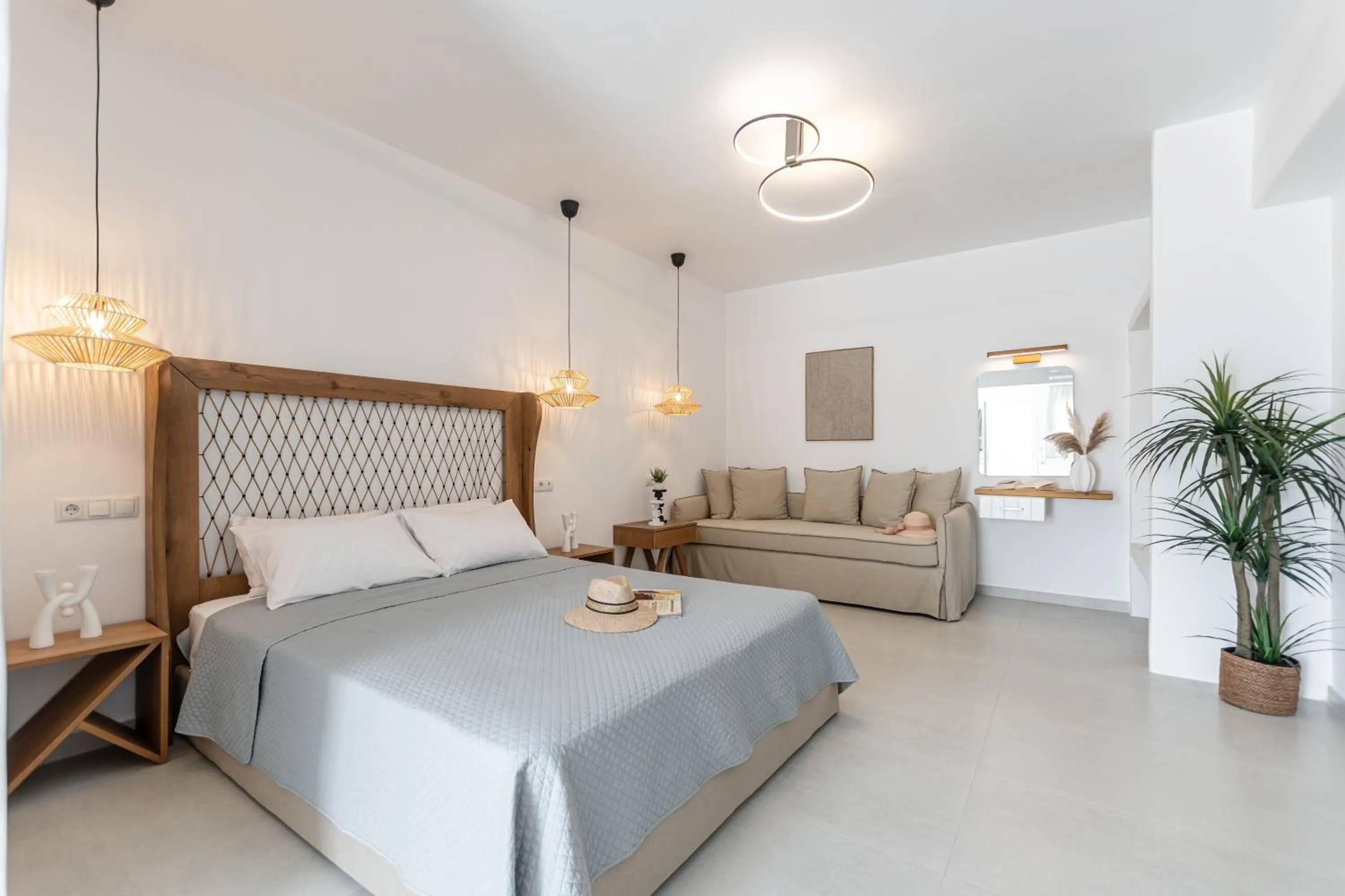 Bed in Birikos Hotel & Suites