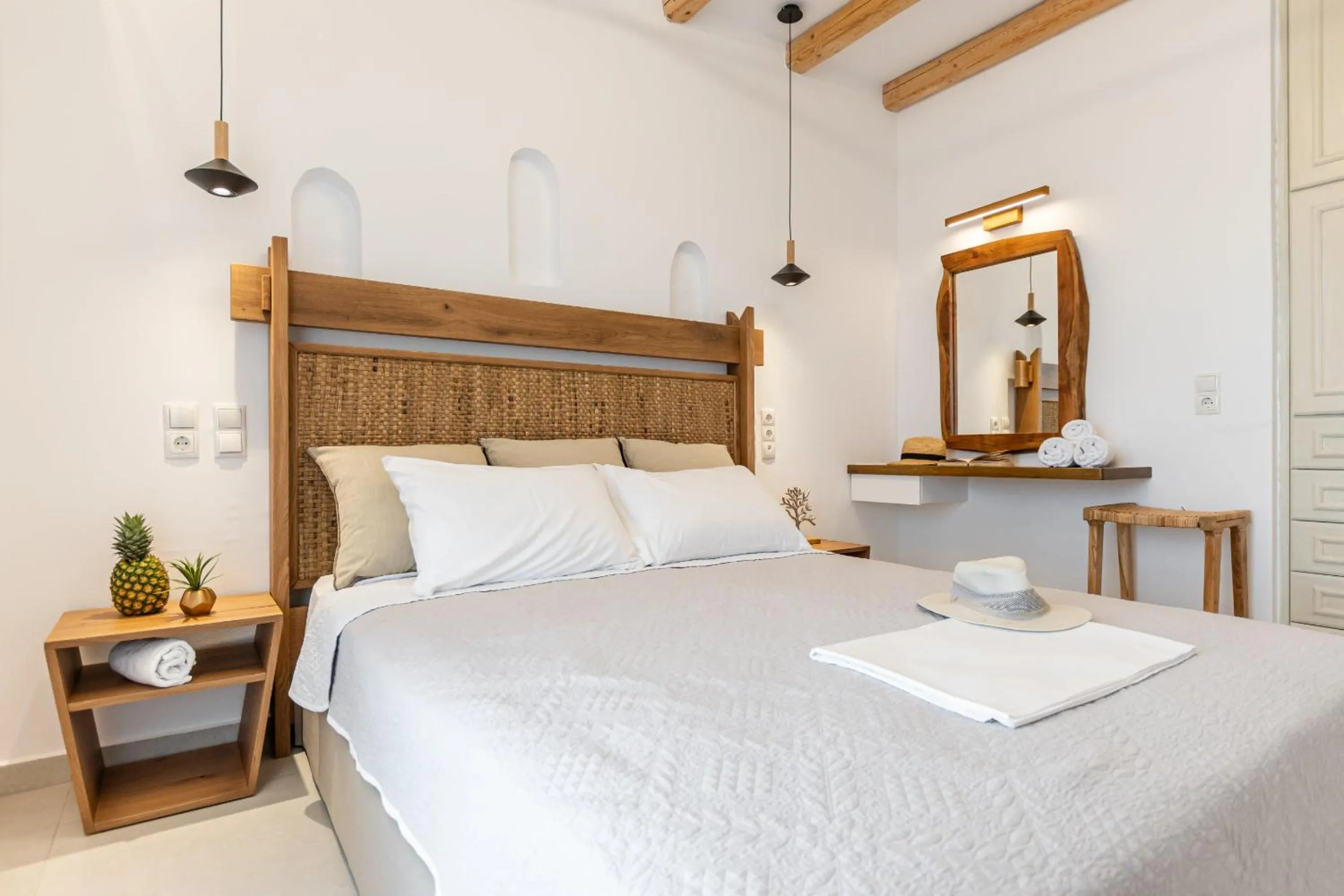 Bed in Birikos Hotel & Suites