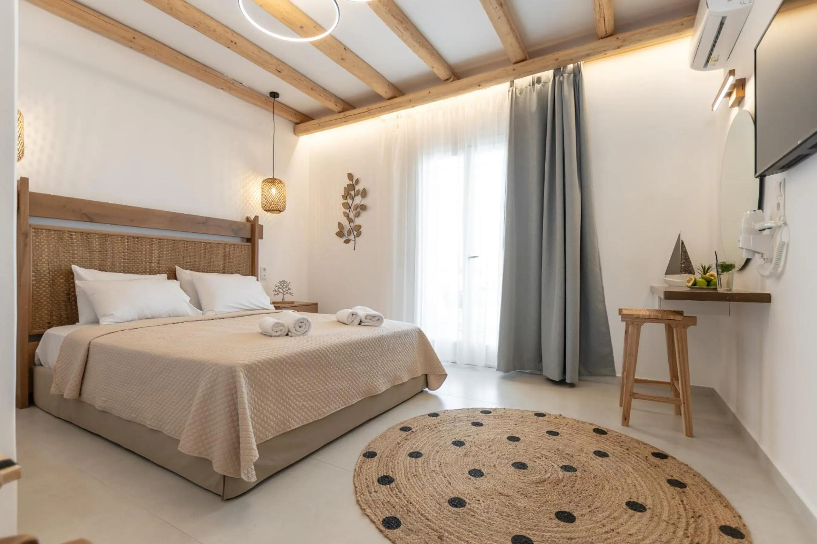 Bed in Birikos Hotel & Suites