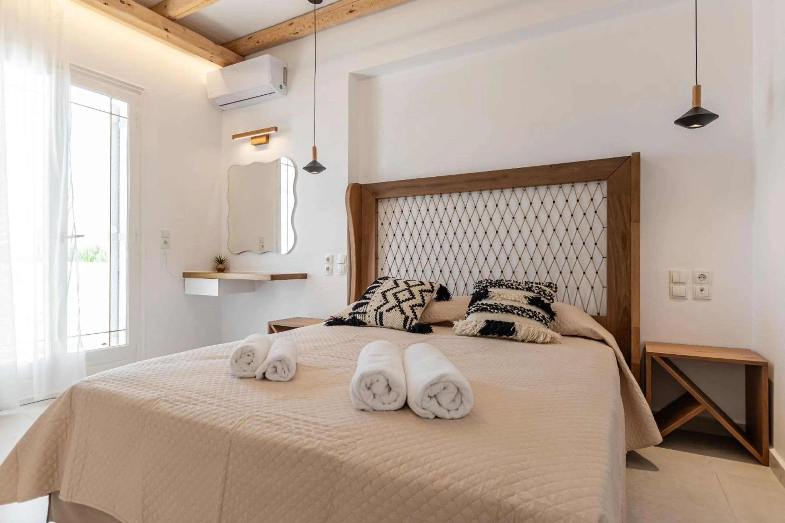 Bed in Birikos Hotel & Suites