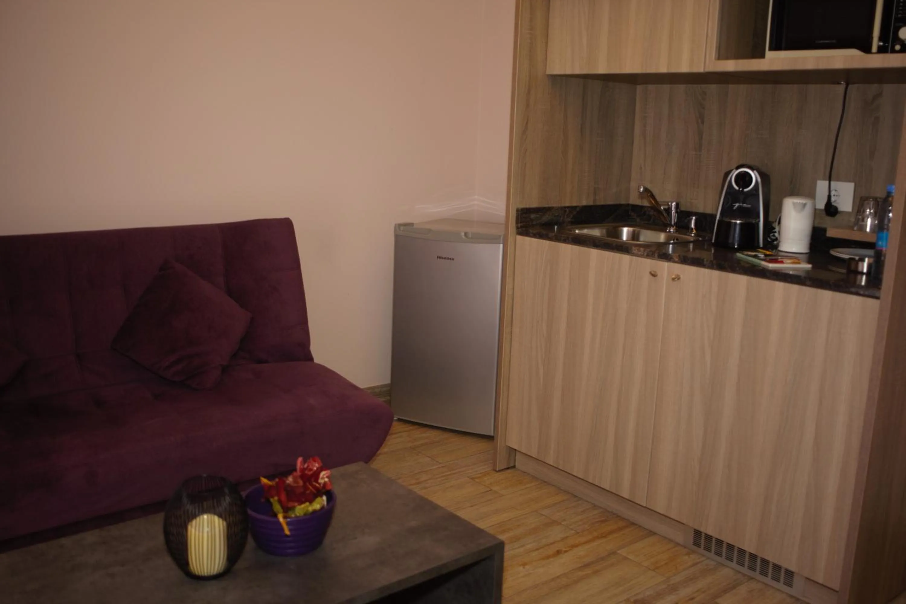 Kitchen or kitchenette in HOtello guest suites