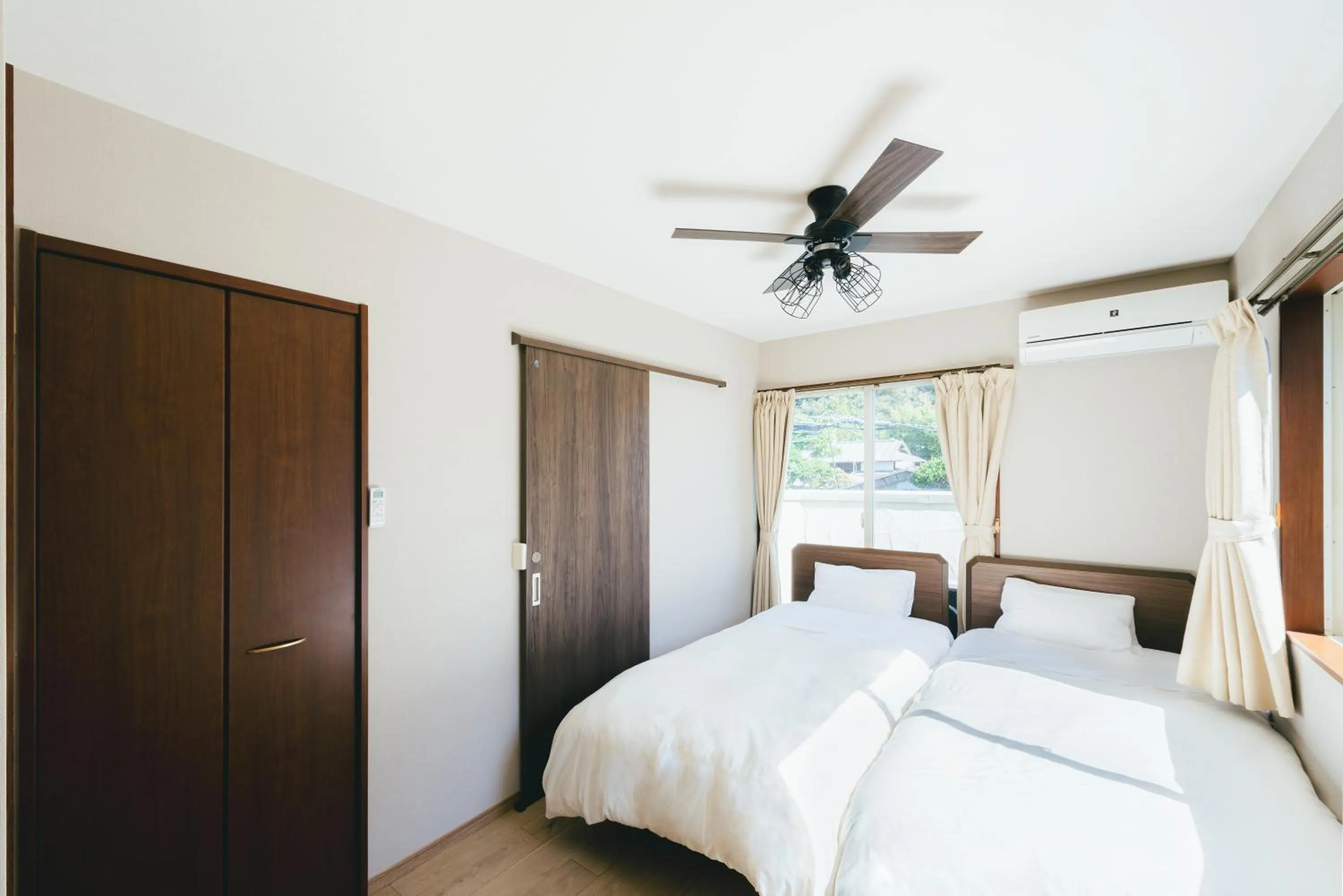 Bed in guesthouse SHIBAFU