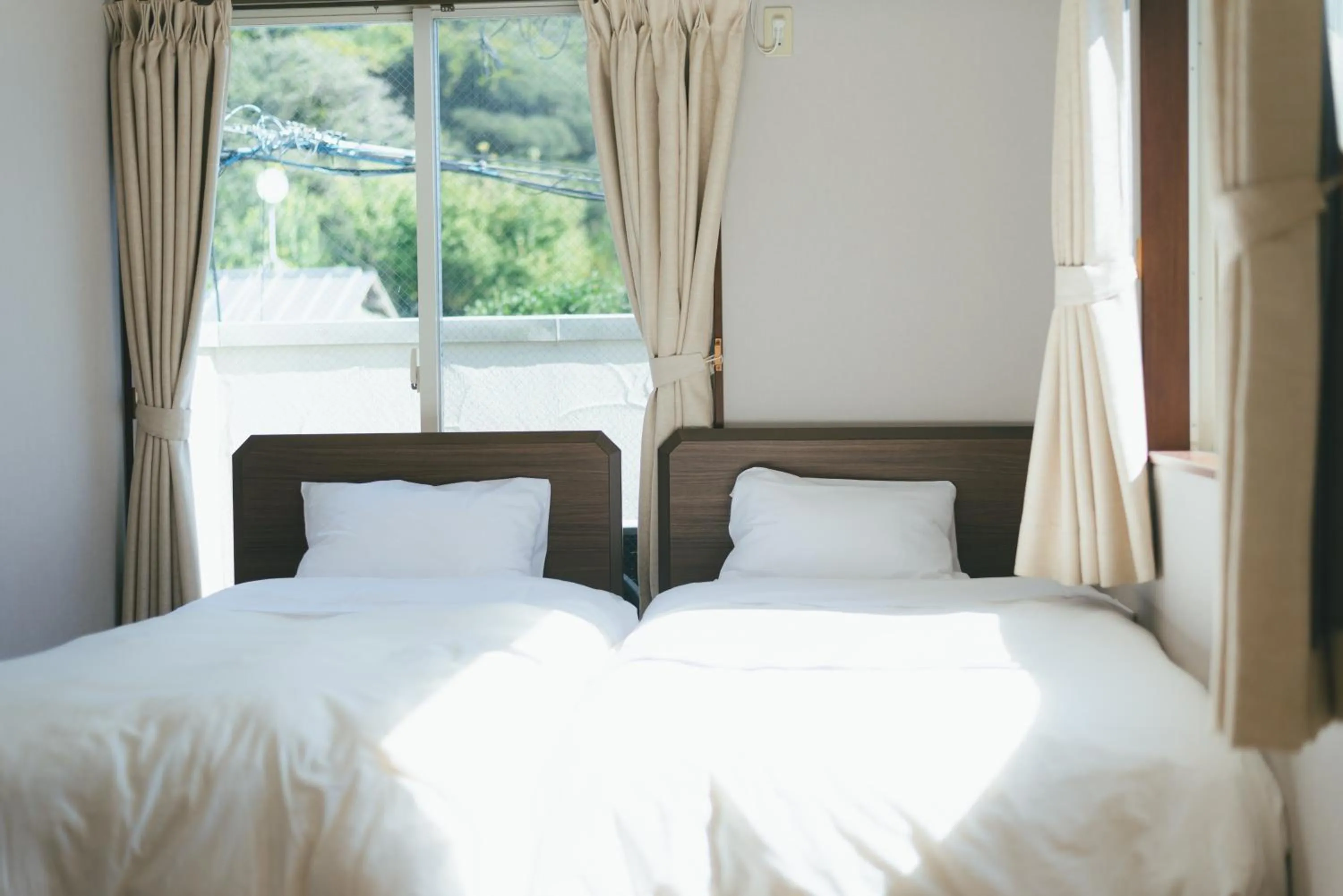 Bed in guesthouse SHIBAFU