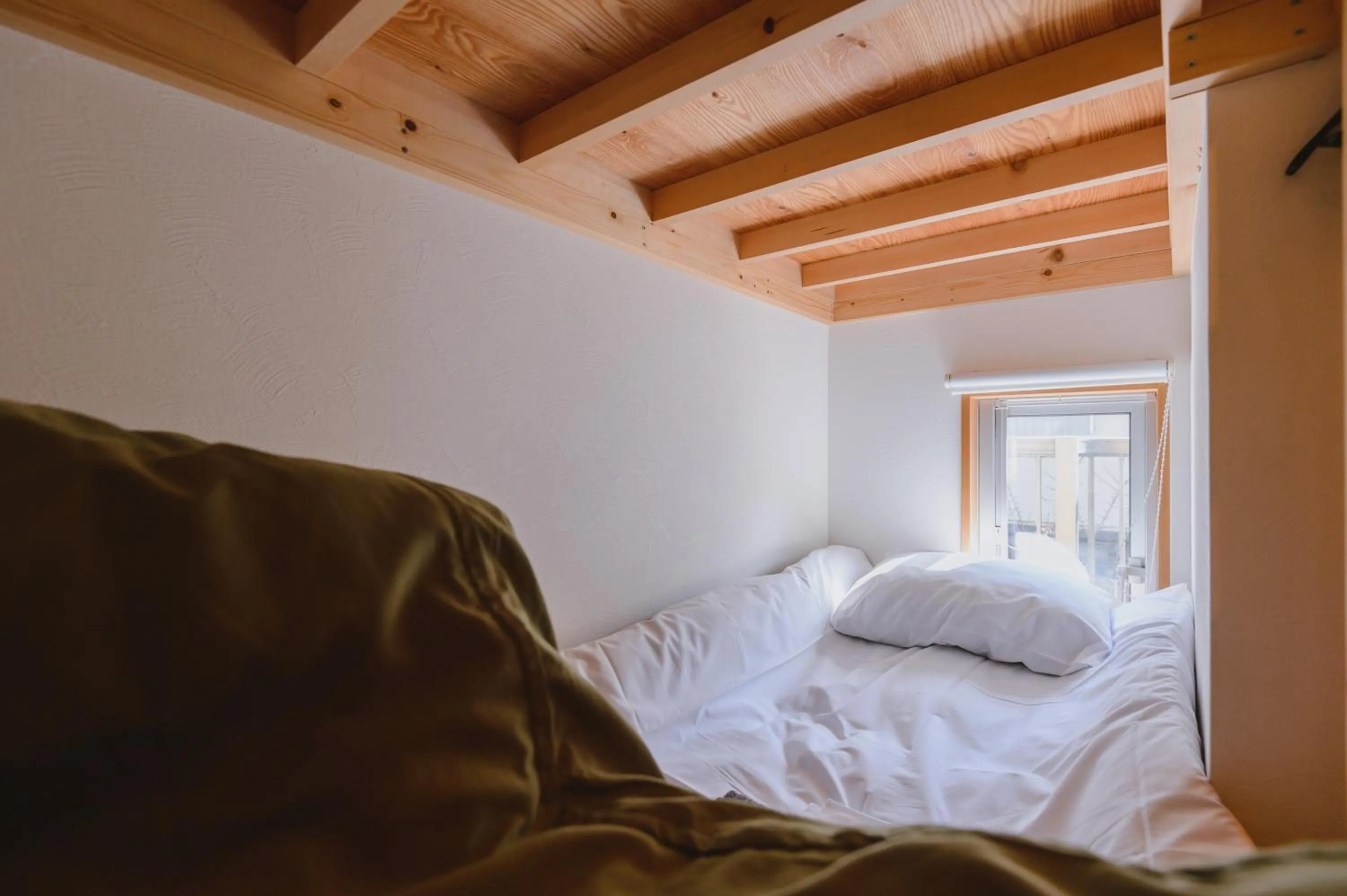 Bed in guesthouse SHIBAFU