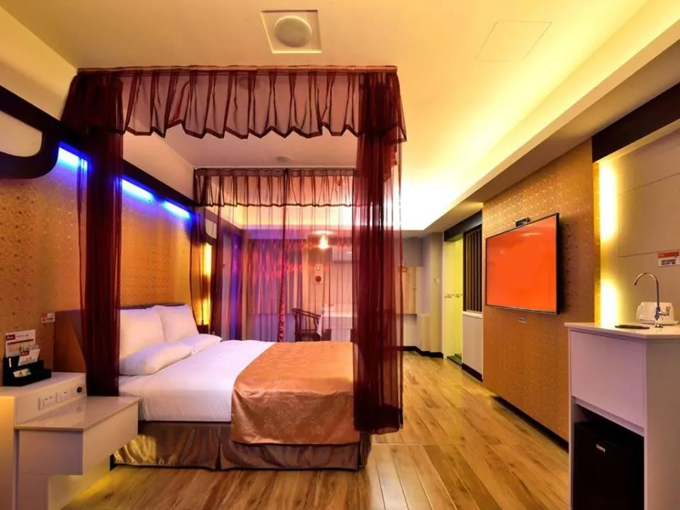 Photo of the whole room, Bed in M Garden Business Hotel