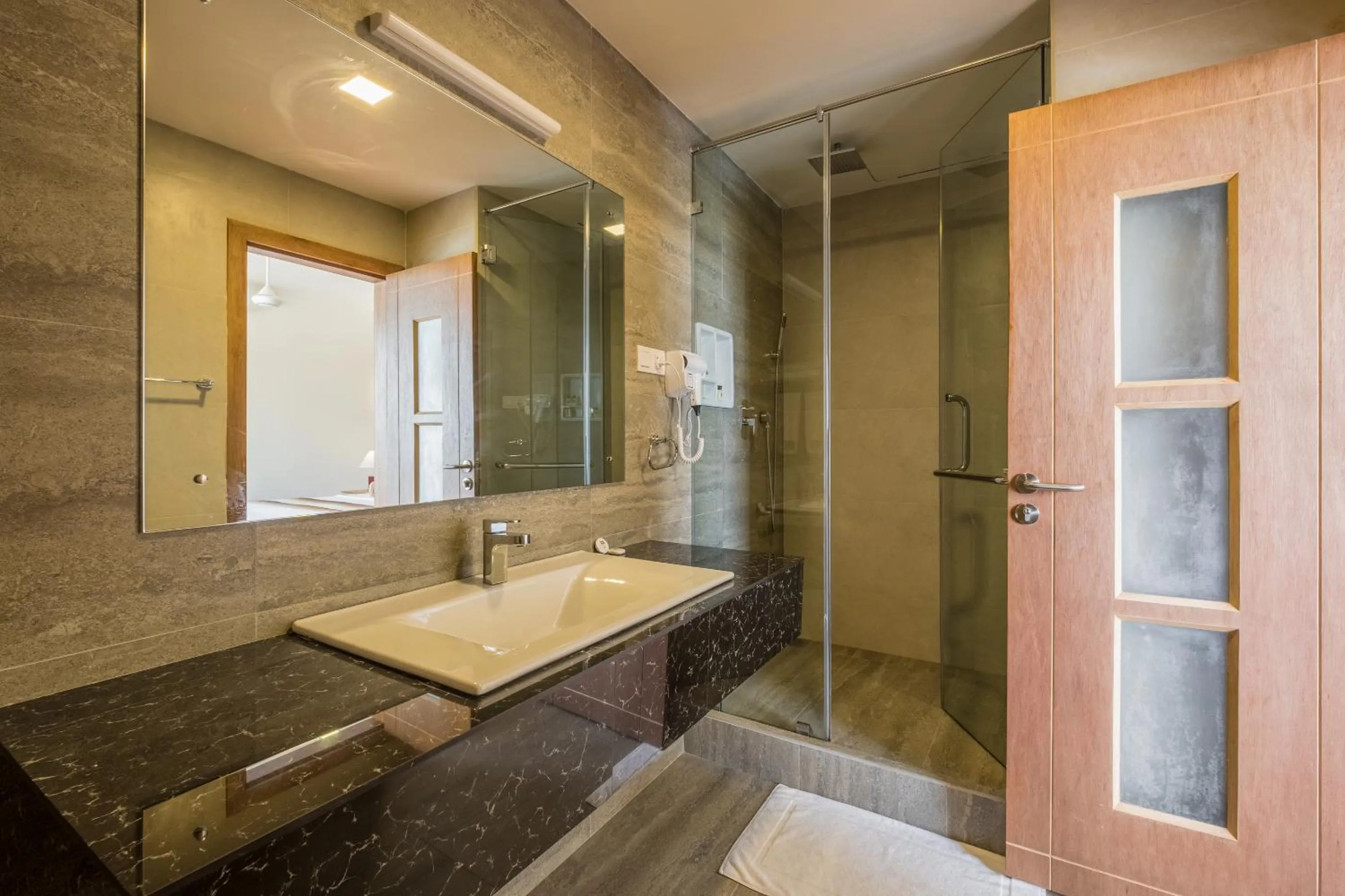 Shower in Twenty-Two Weligambay