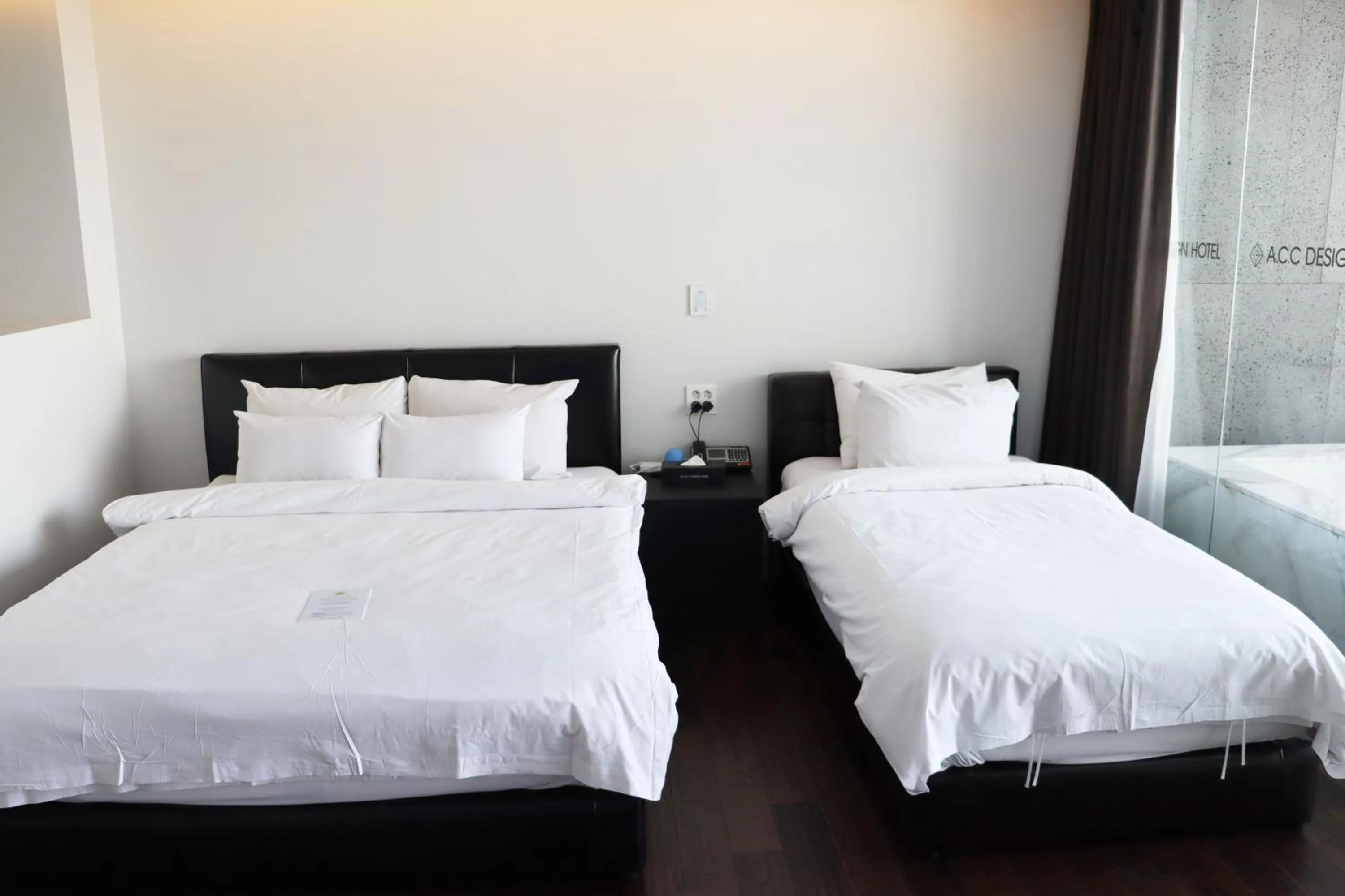 Bed in ACC Design Hotel