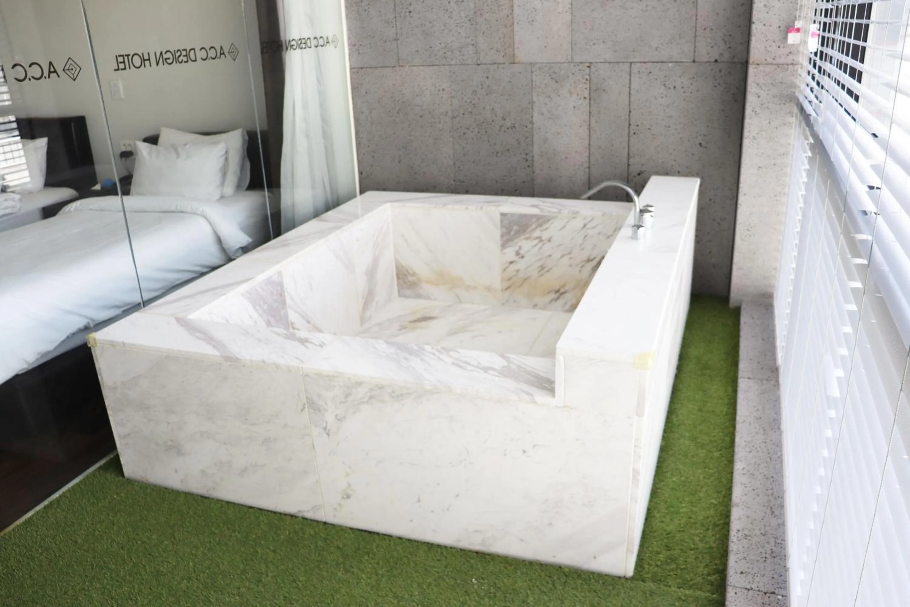 Bed in ACC Design Hotel