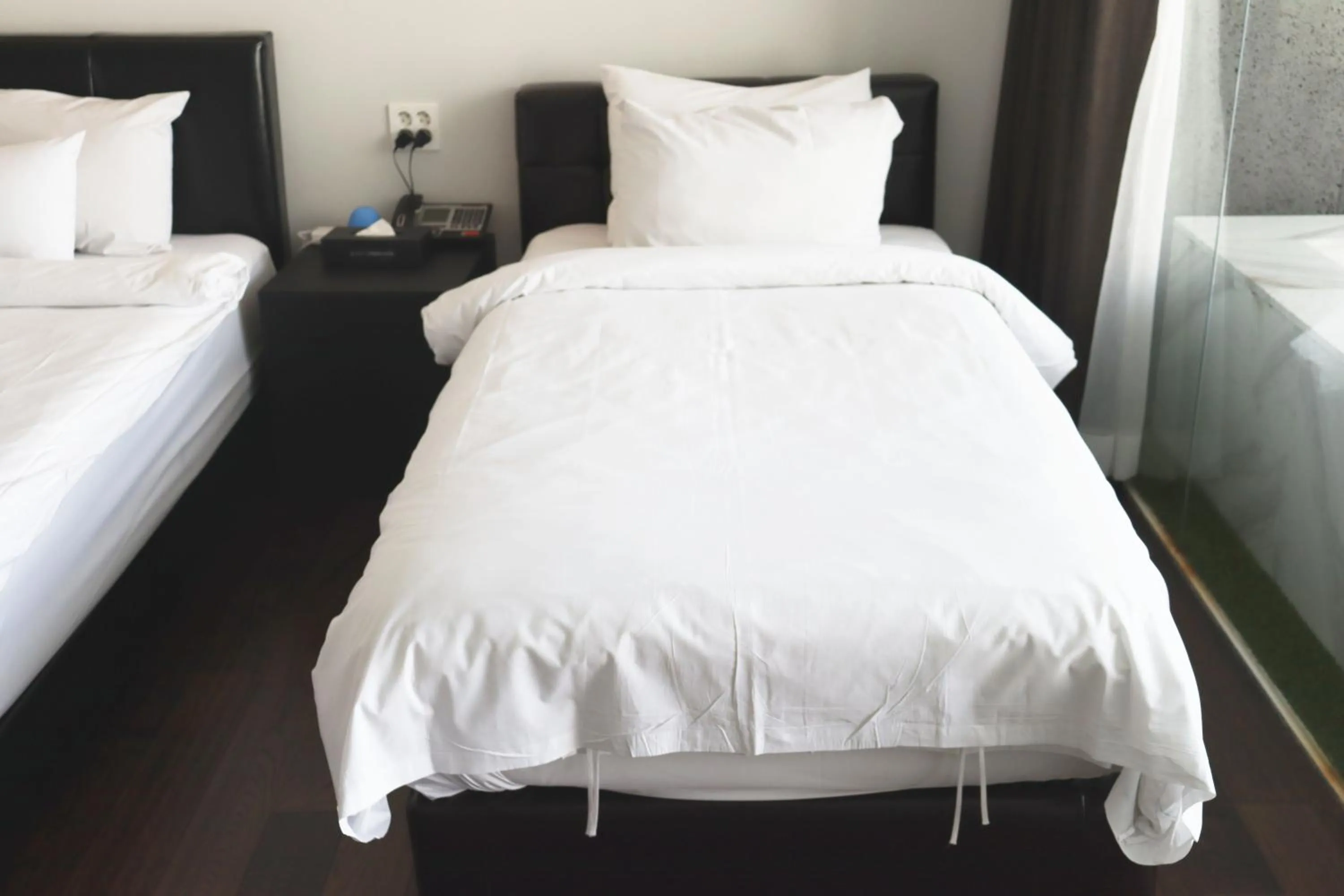 Bed in ACC Design Hotel