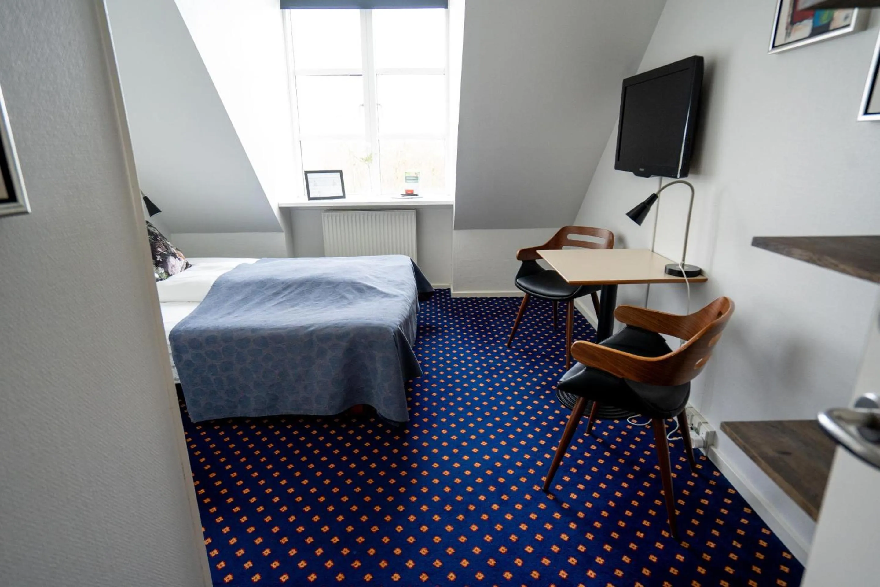 Bed in Hotel Aarslev Kro