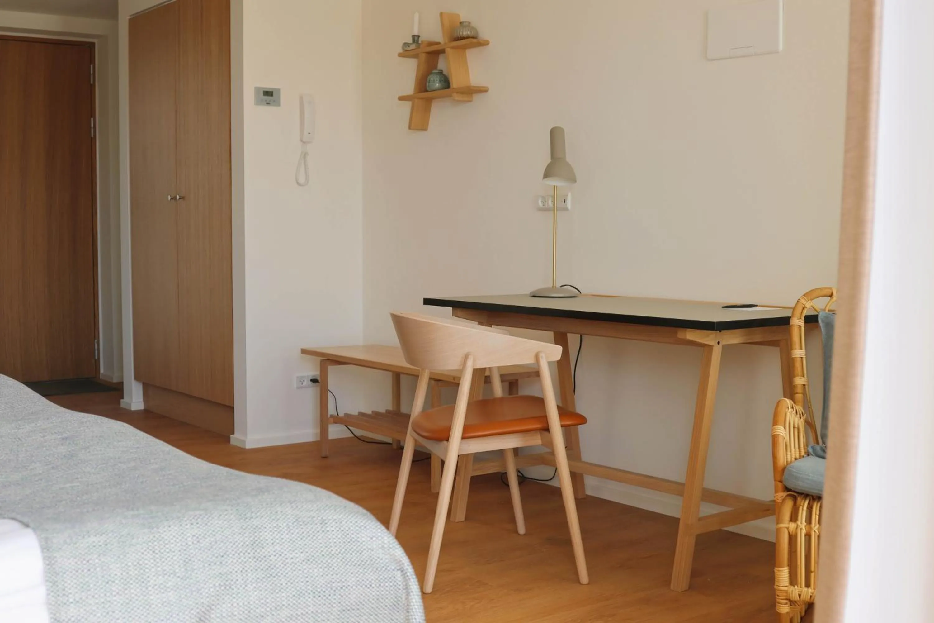 Seating area, Bed in Color Hotel Skagen