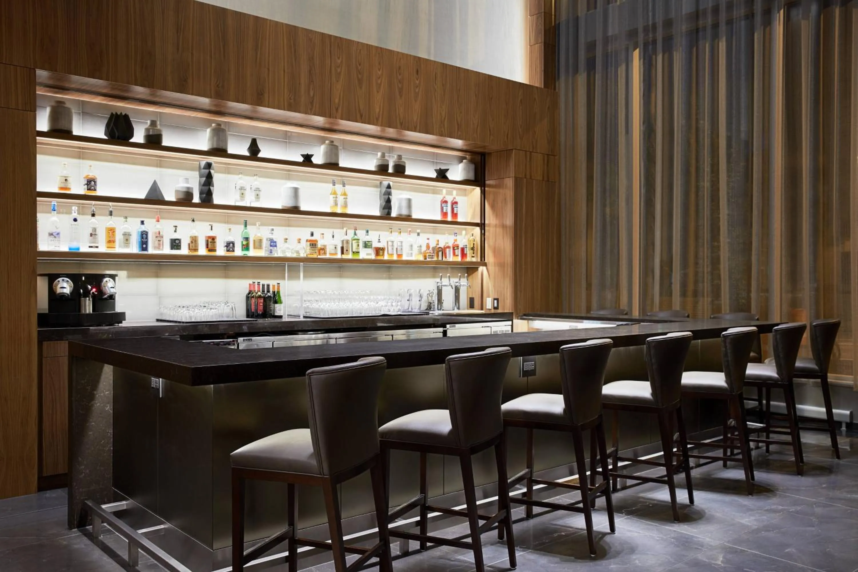 Lounge or bar in AC Hotel by Marriott Madison Downtown