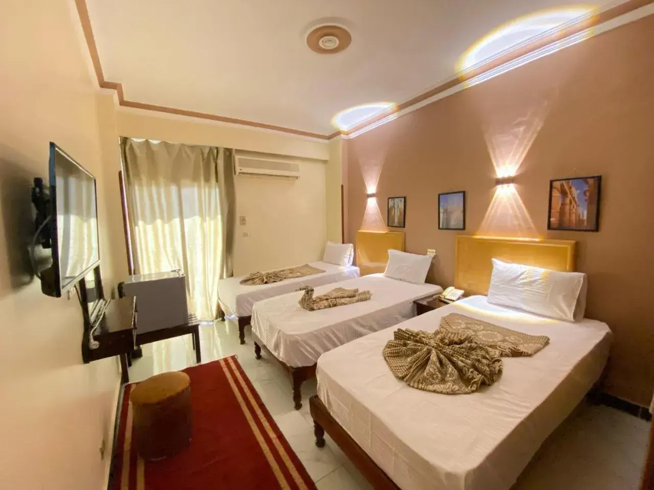 Triple Room with Pool View in Shady Hotel Luxor Triple Room with Pool View in Shady Hotel Luxor