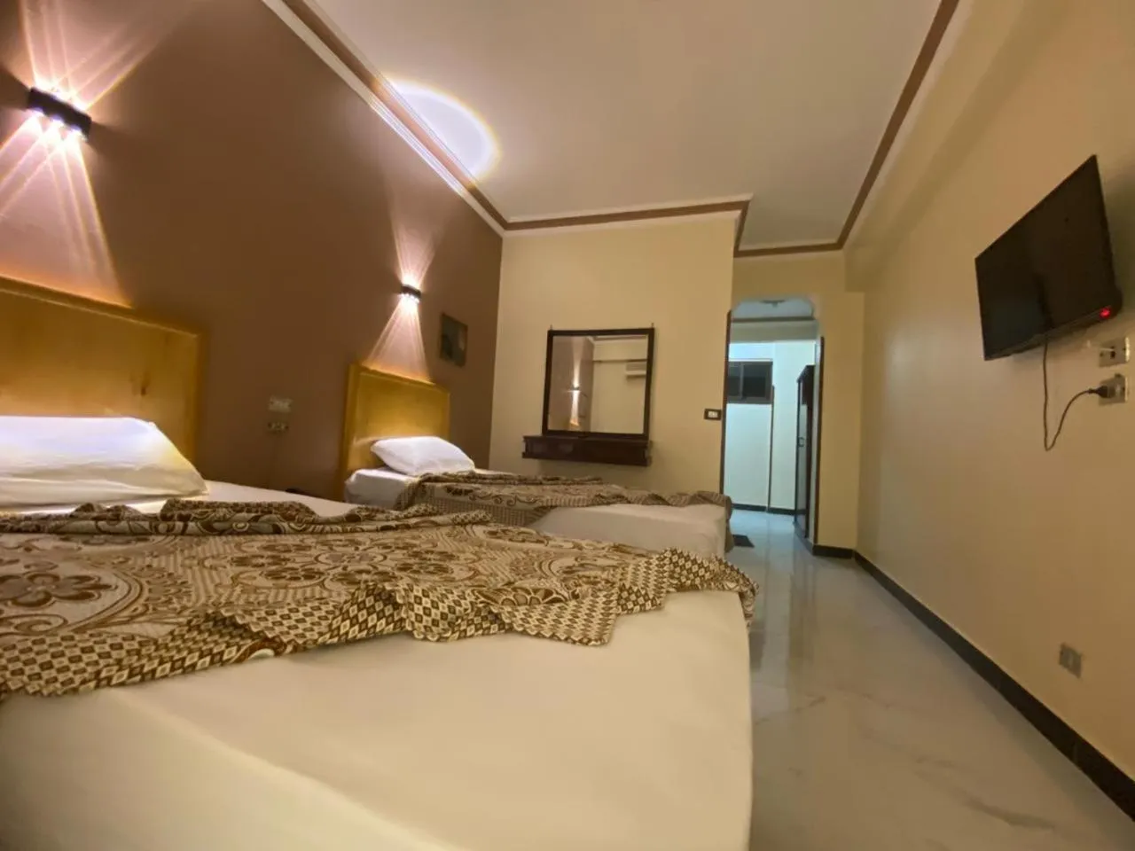 Bed in Shady Hotel Luxor