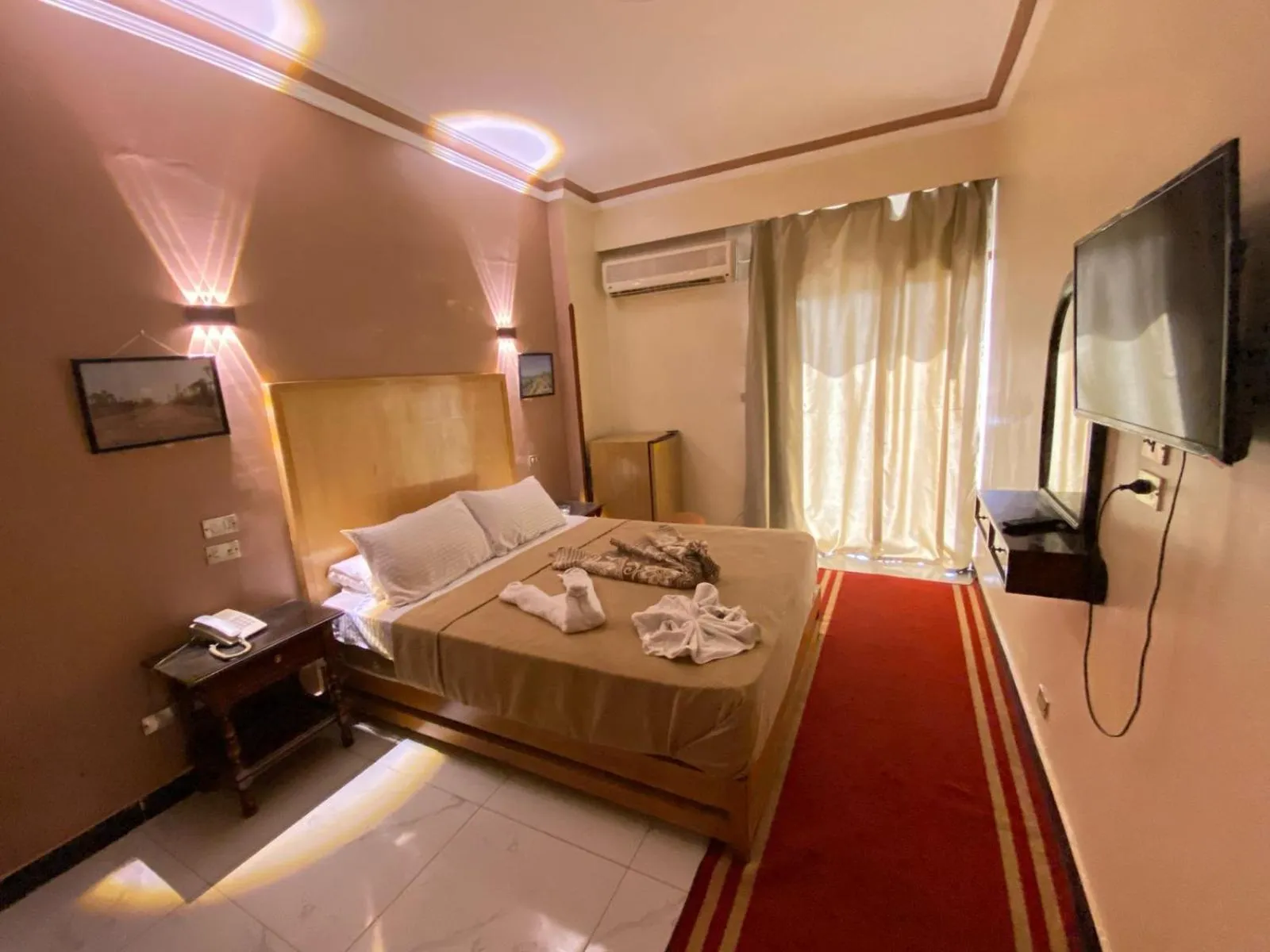 Bed in Shady Hotel Luxor