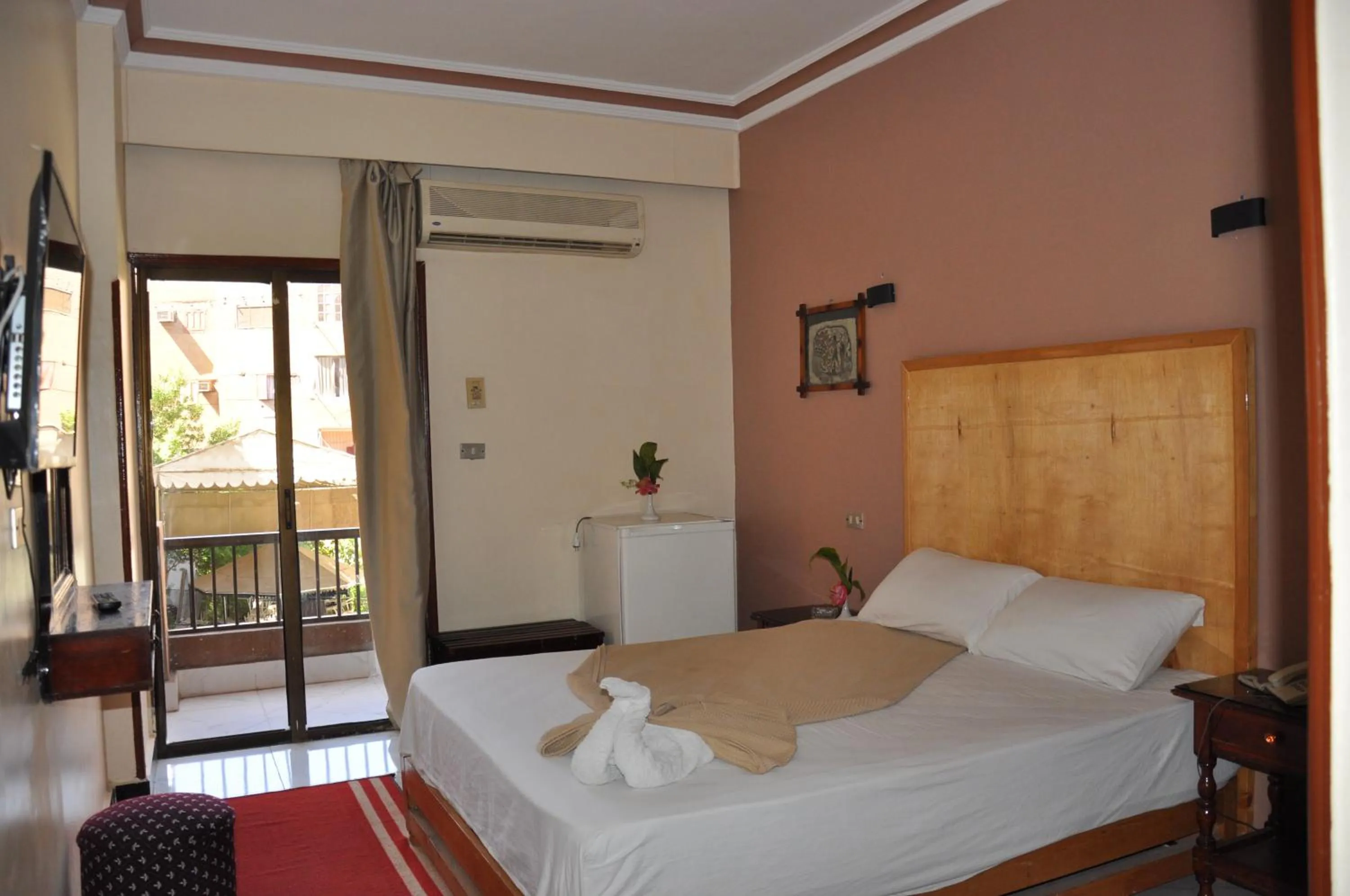 Bed in Shady Hotel Luxor