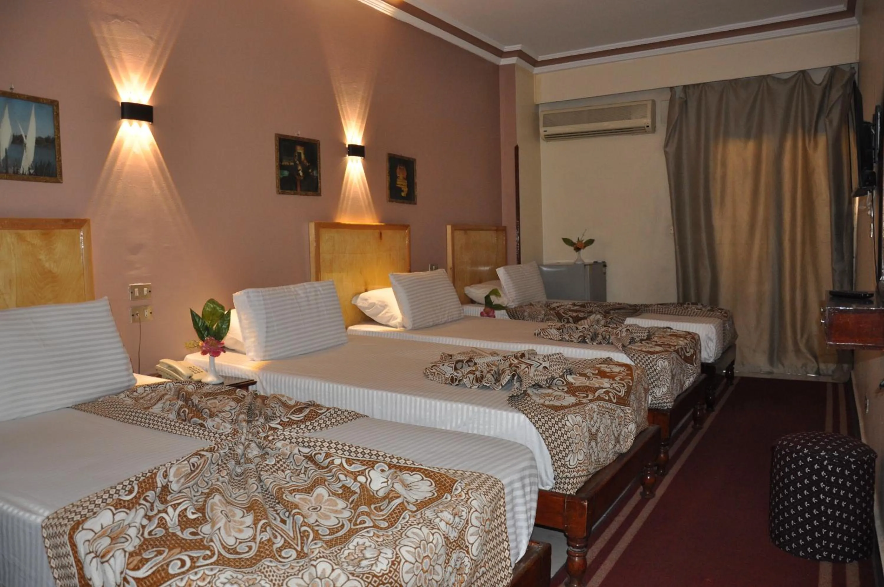 Bed in Shady Hotel Luxor