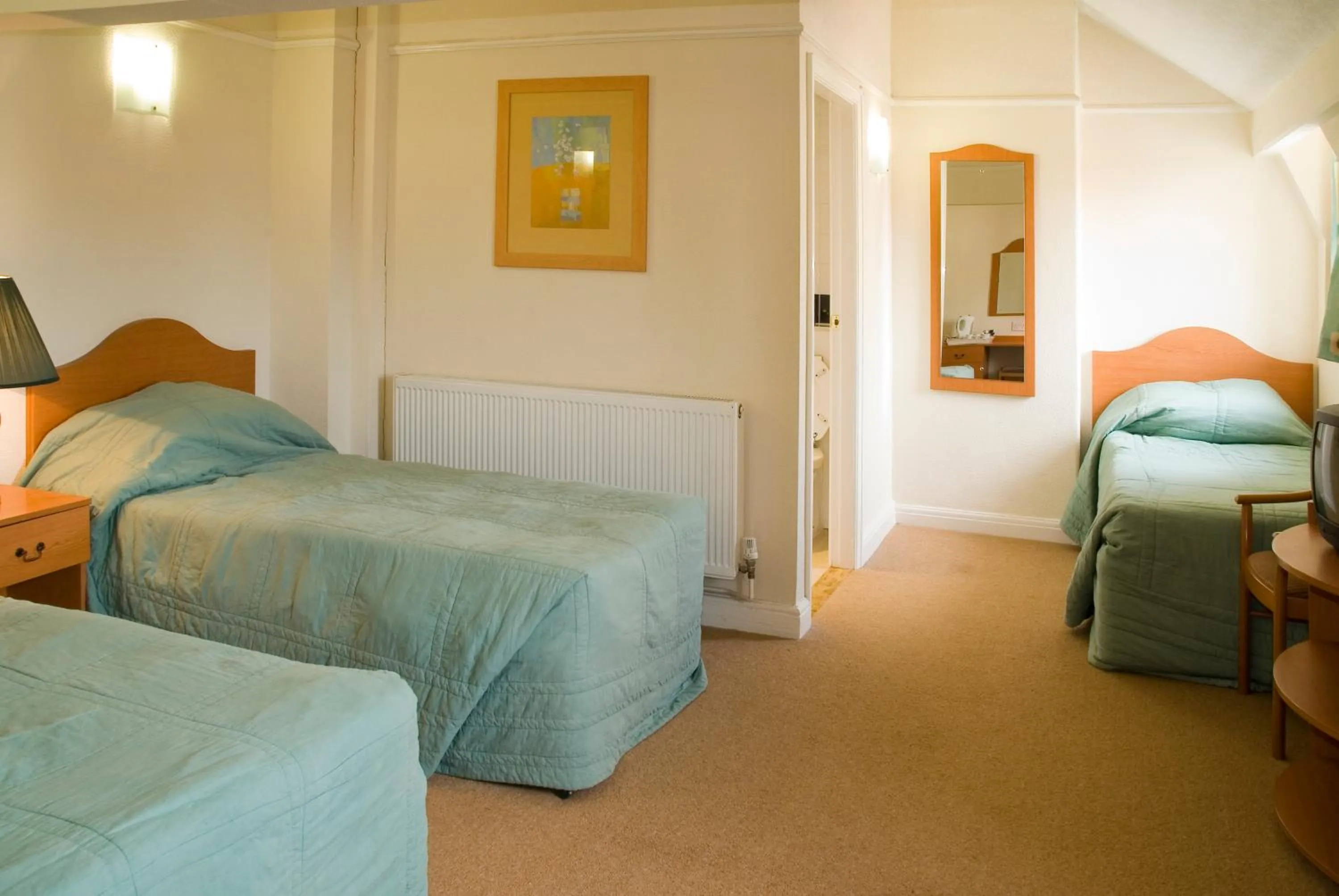 Bed in The Metropole Hotel