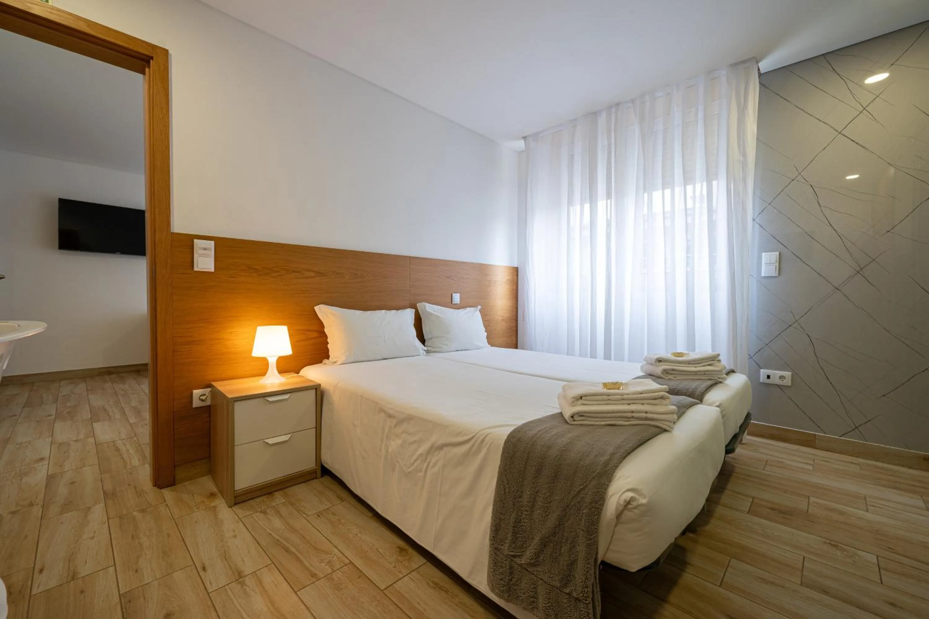 Bed in Central Suites