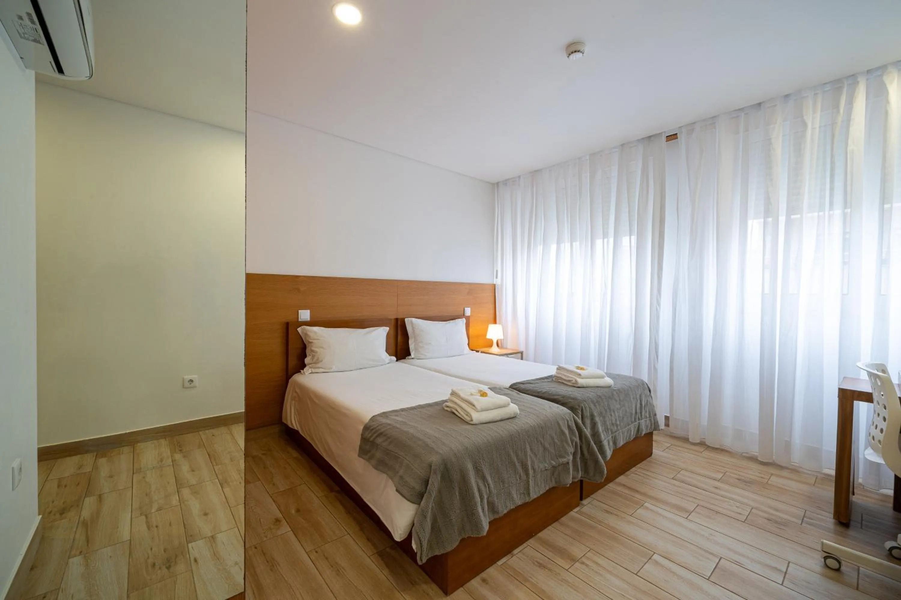 Bed in Central Suites