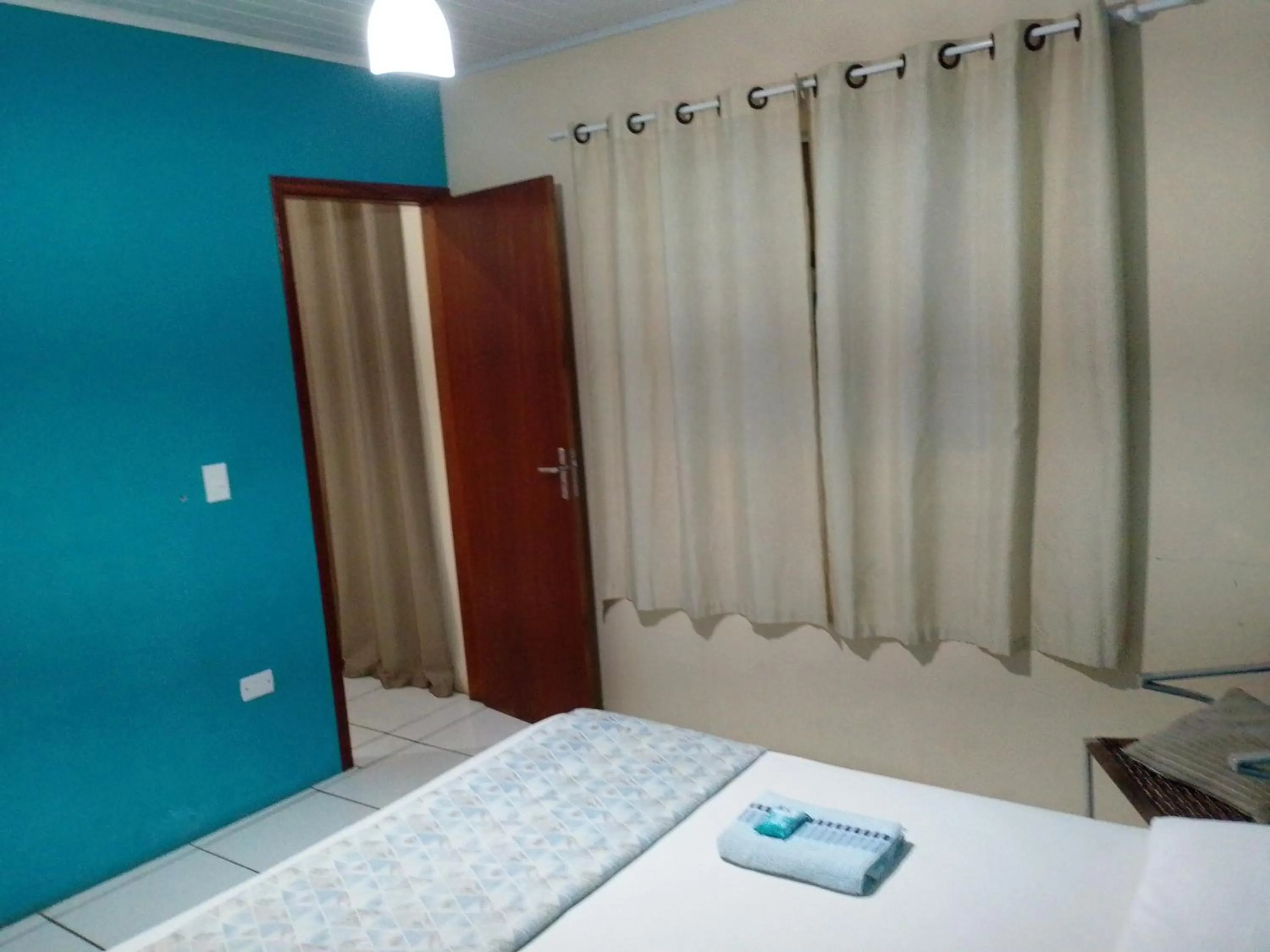 Bed in Hospedagem Pousada Fantasia Paraty